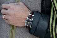 A Rolex Precision watch on a wrist