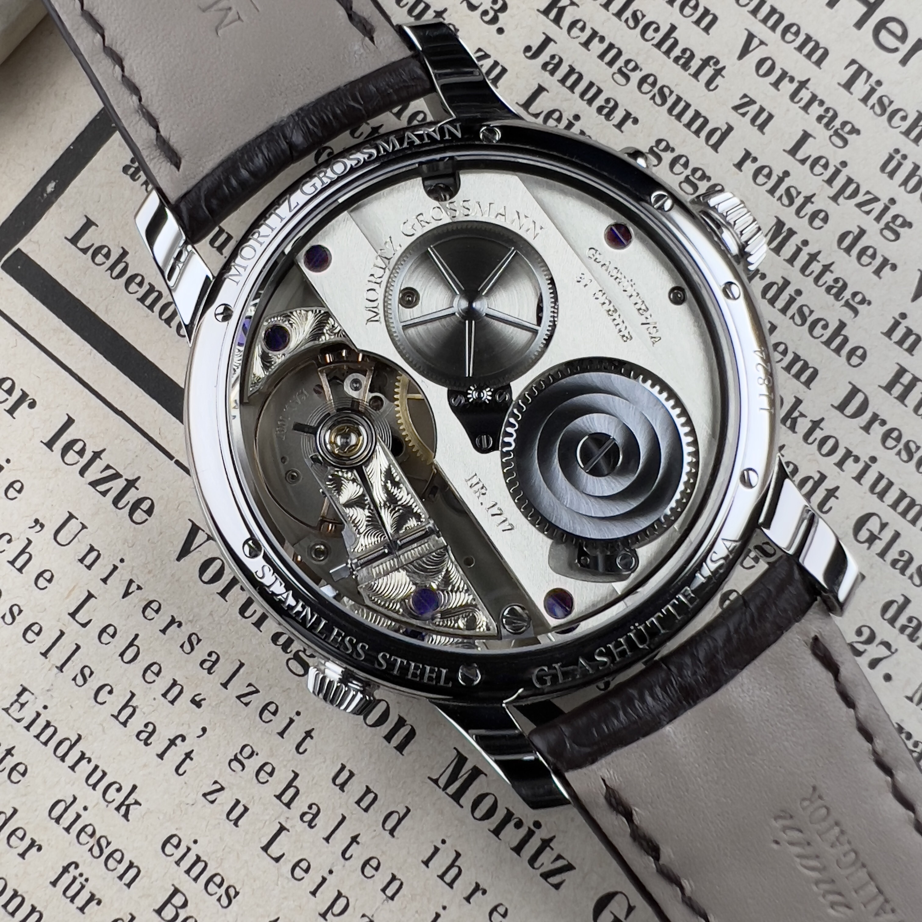 A caseback image of the Moritz Grossmann Universalzeit 