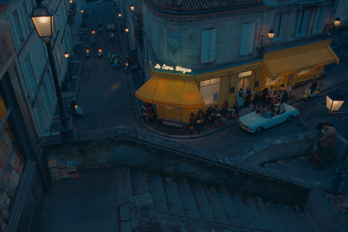 Color shot  of a French cafe as shot for The French Dispatch's opening sequence narrated by Wilson's Sazerac