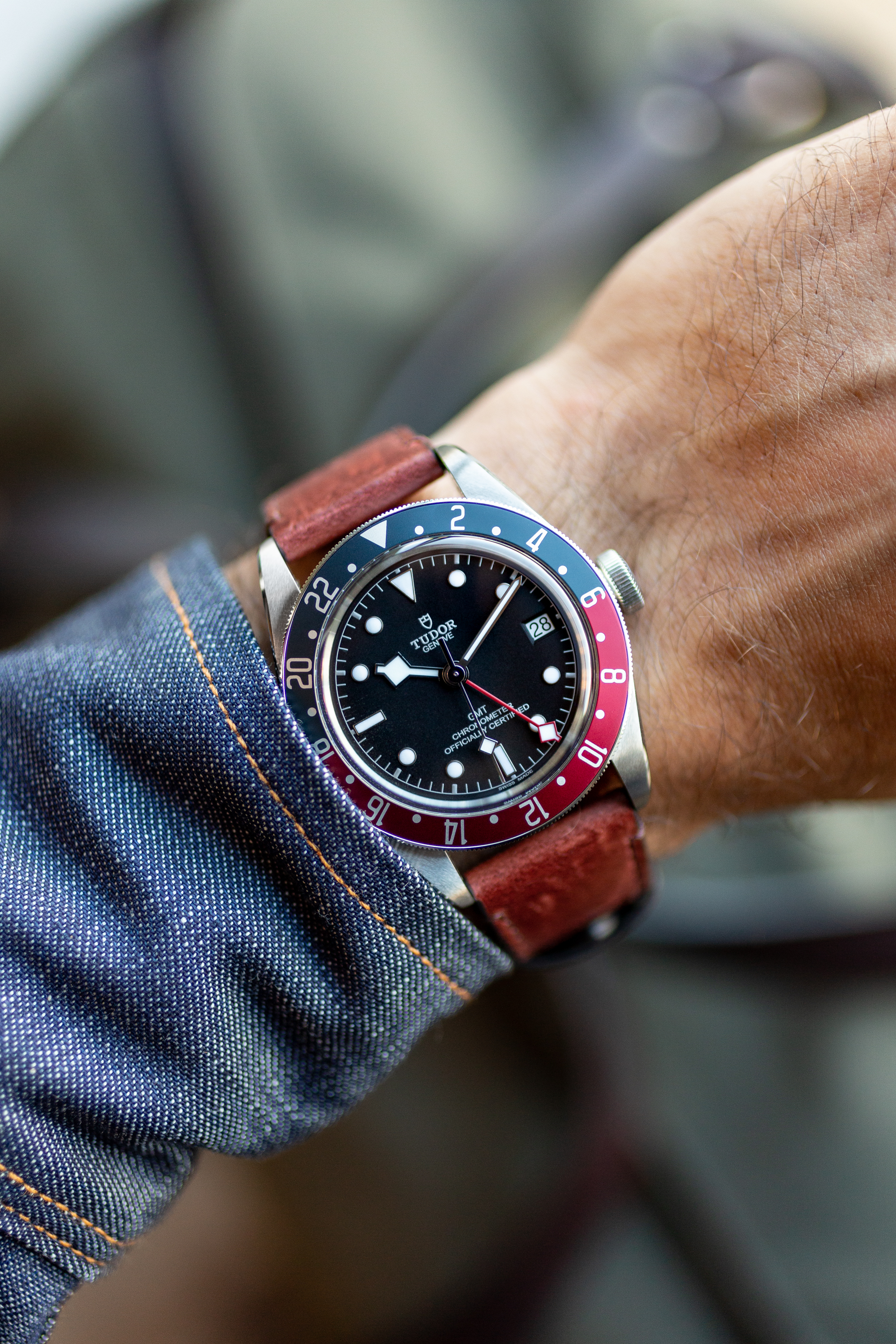 A Tudor Black Bay GMT on the author's wrist. 