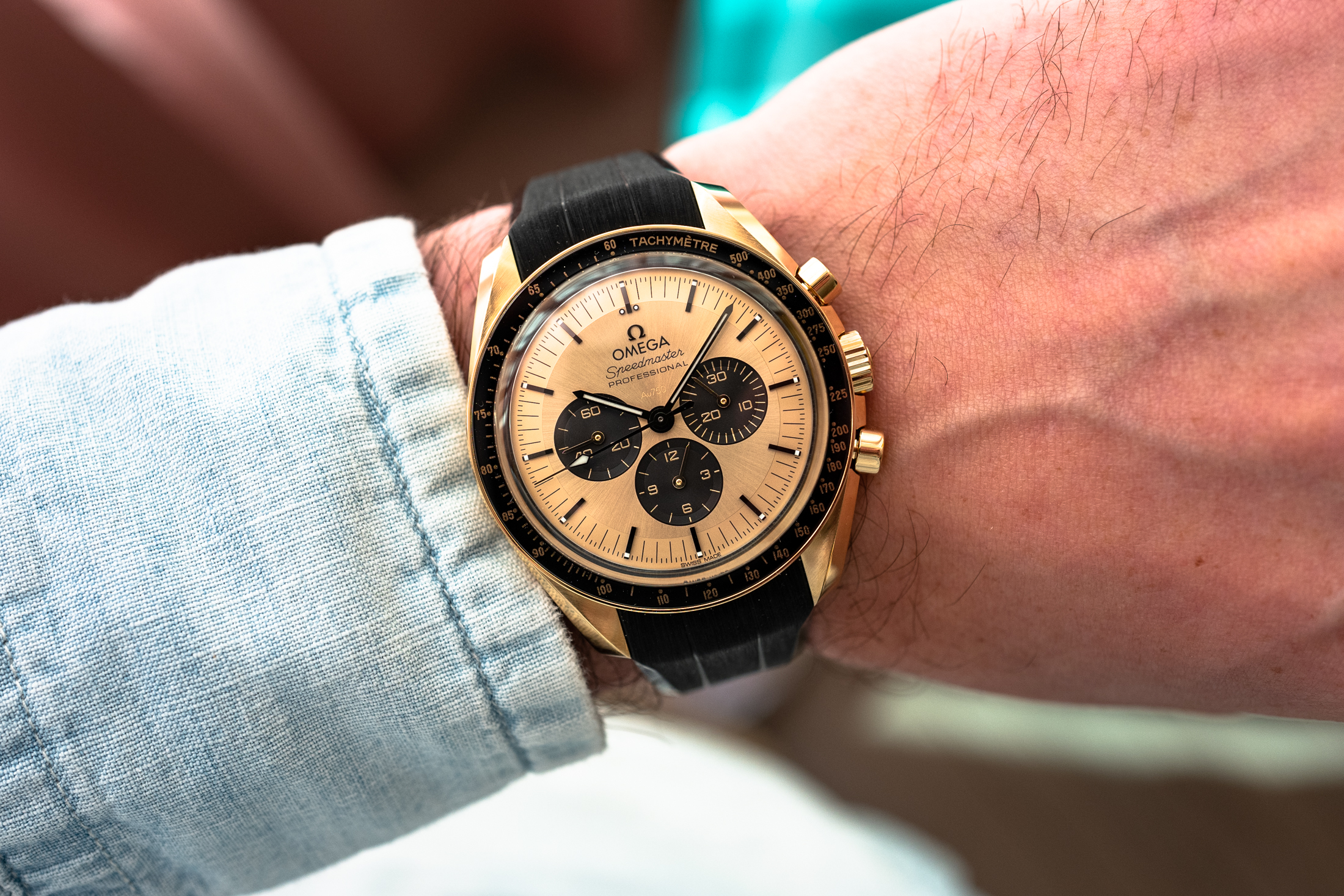 the moonshine speedmaster on a rubber strap on the author's wrist. 