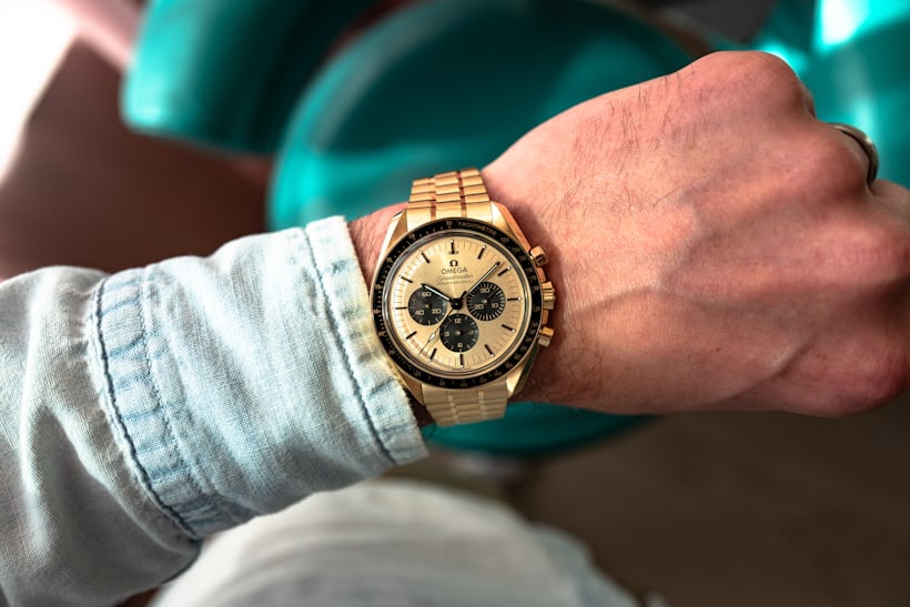the gold dial moonshine speedmaster on the author's wrist. 