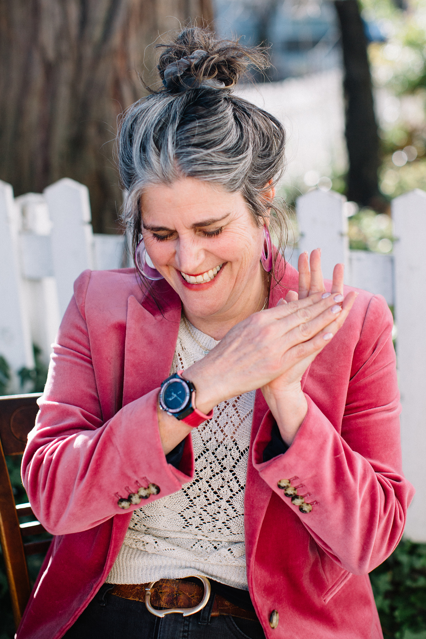 A woman wearing a Hublot Big Bang watch
