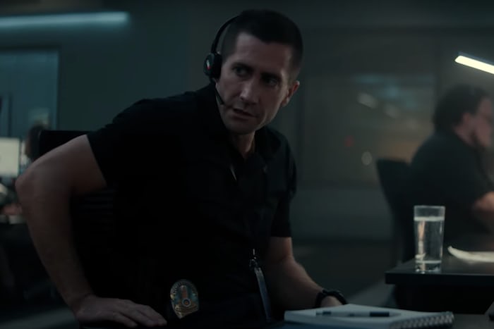 Baylor (Gyllenhaal) working the phones and the case from his desk, wearing his G-Shock in The Guilty. 