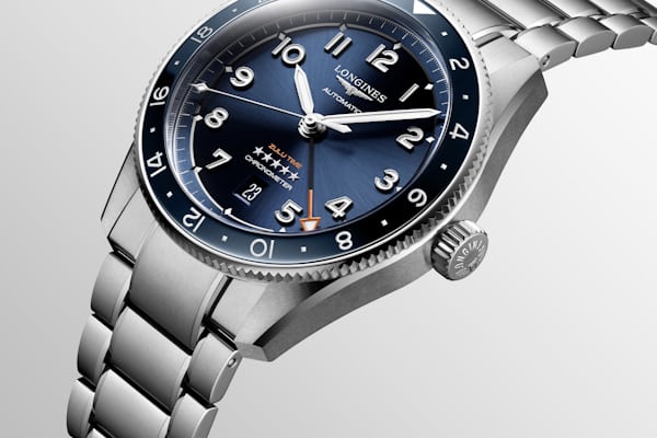 A soldier image of the Longines GMT Zulu Time with a blue dial