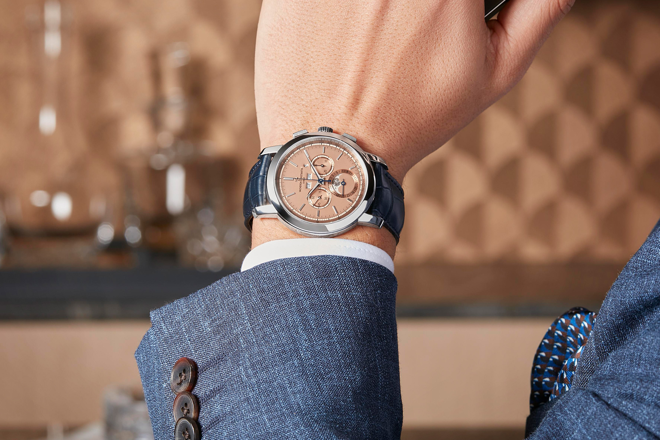 the VC on a man's wrist