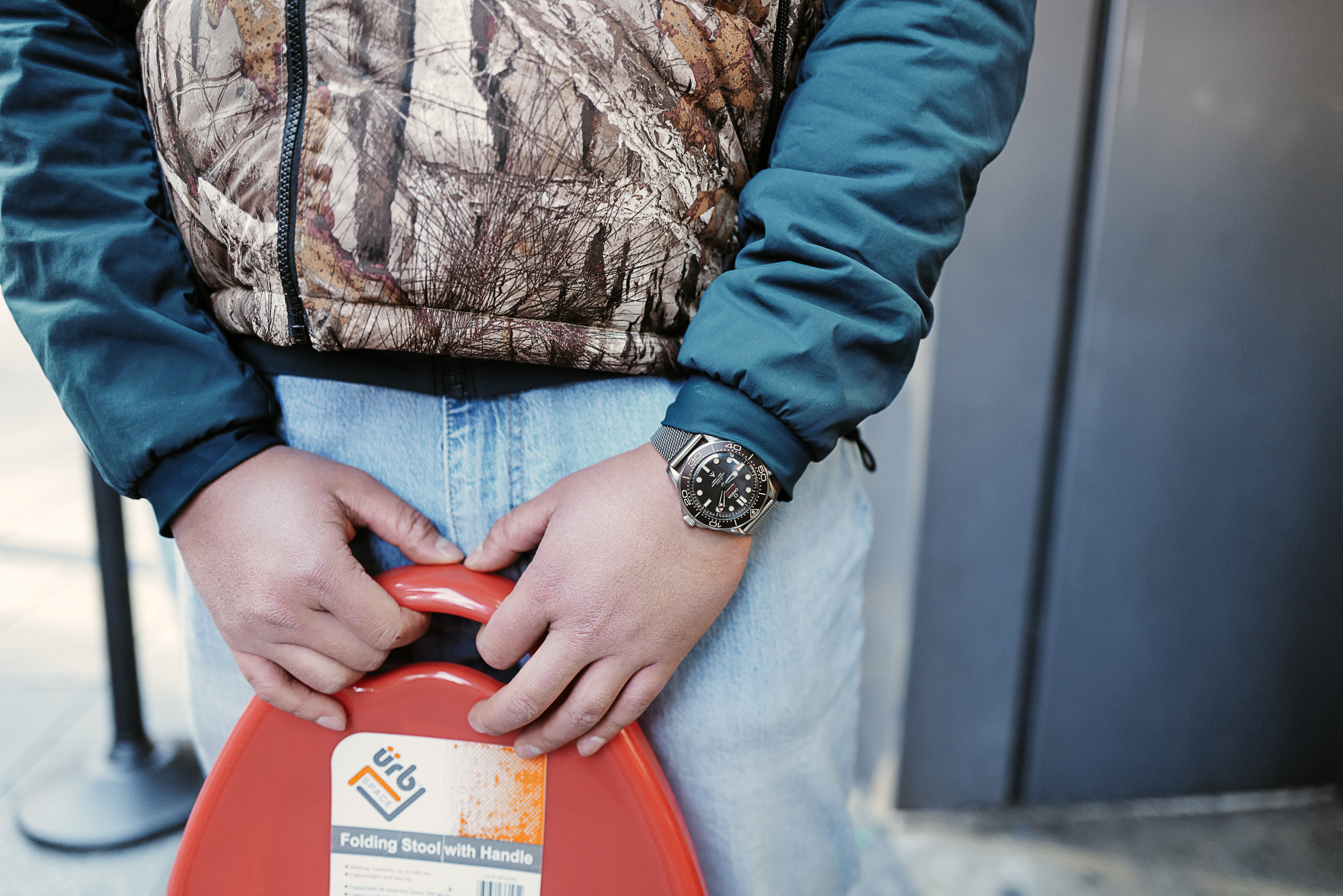A man wears a watch. 
