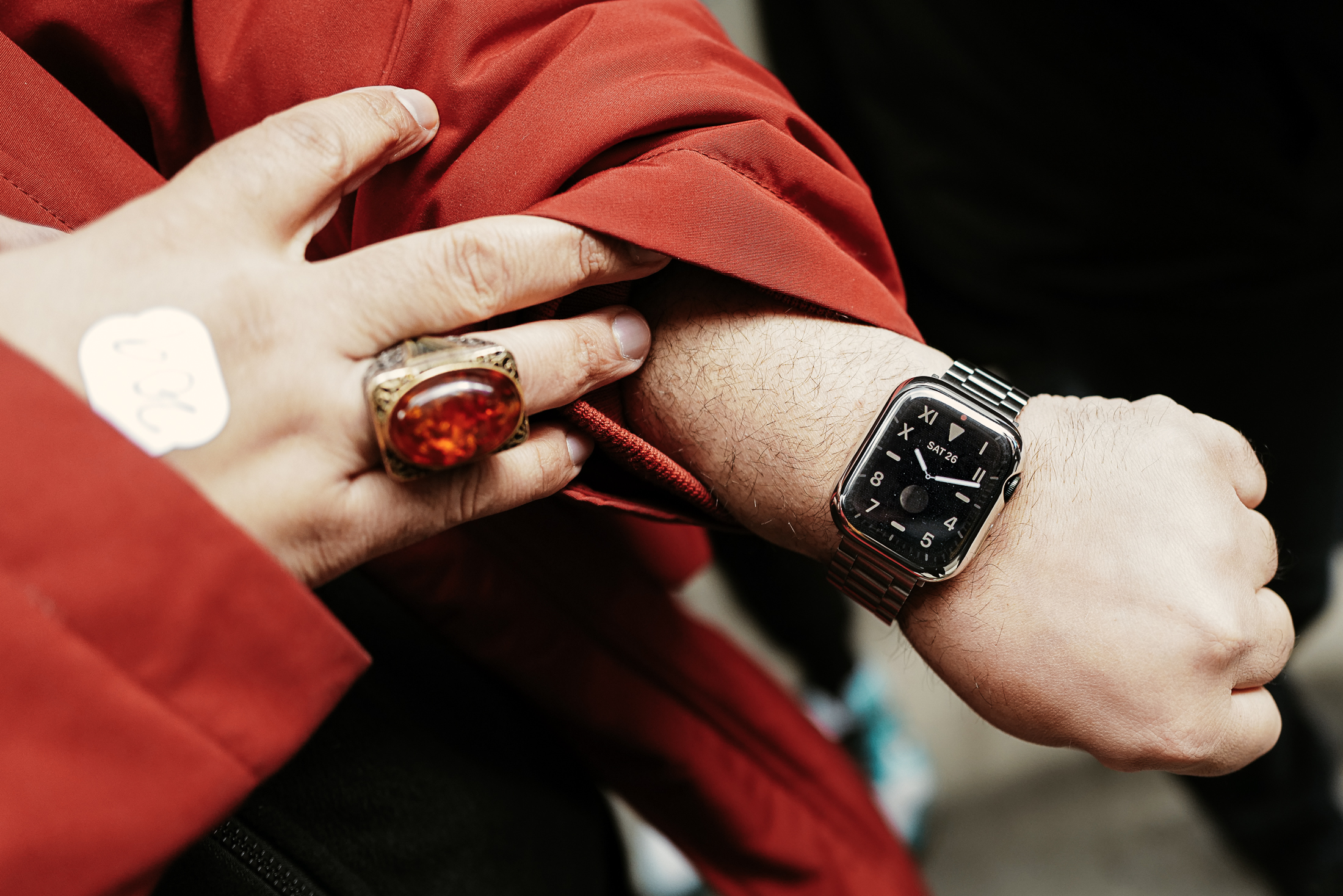 A man wears a watch. 