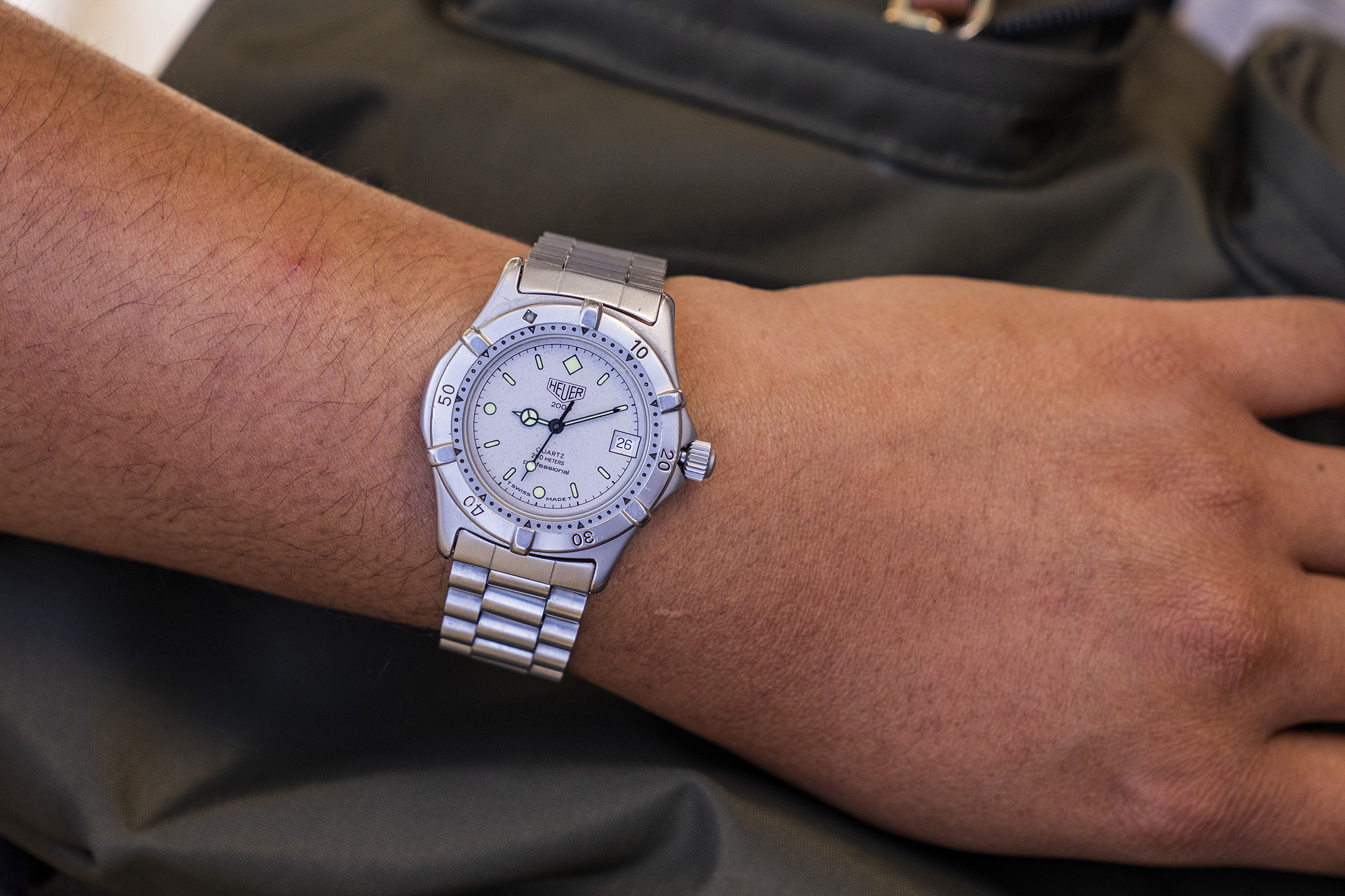 A woman wears a watch. 