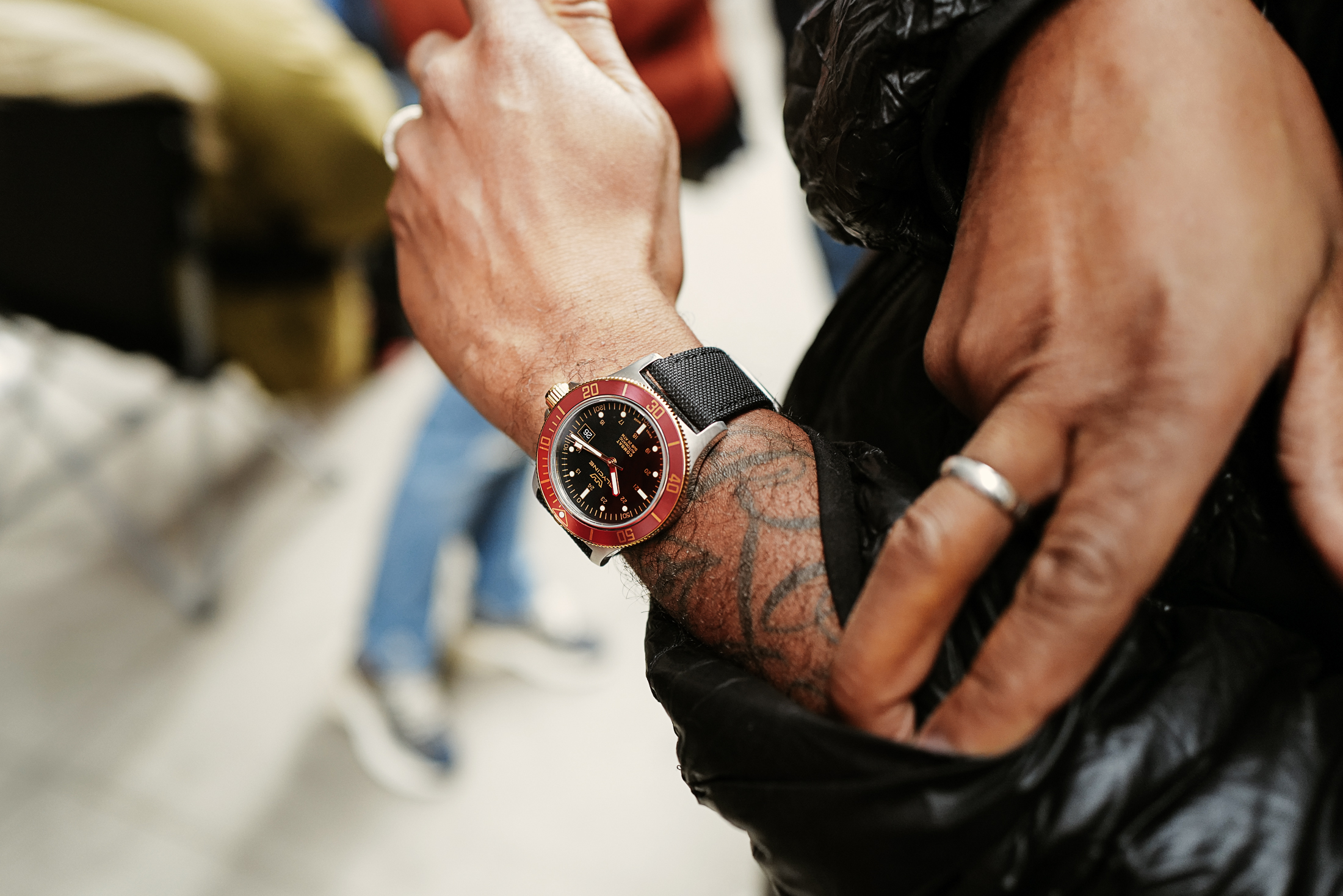 A man wears a watch. 