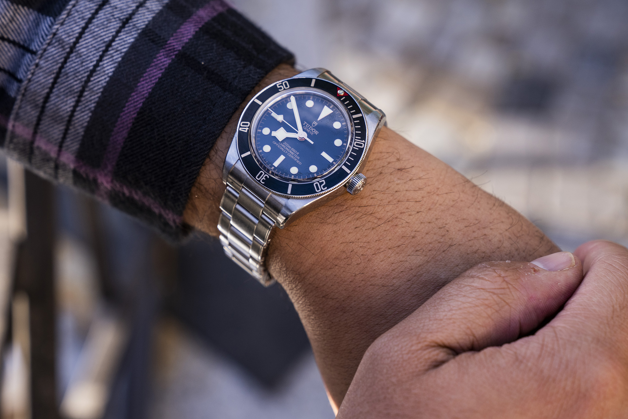 A man wears a watch. 