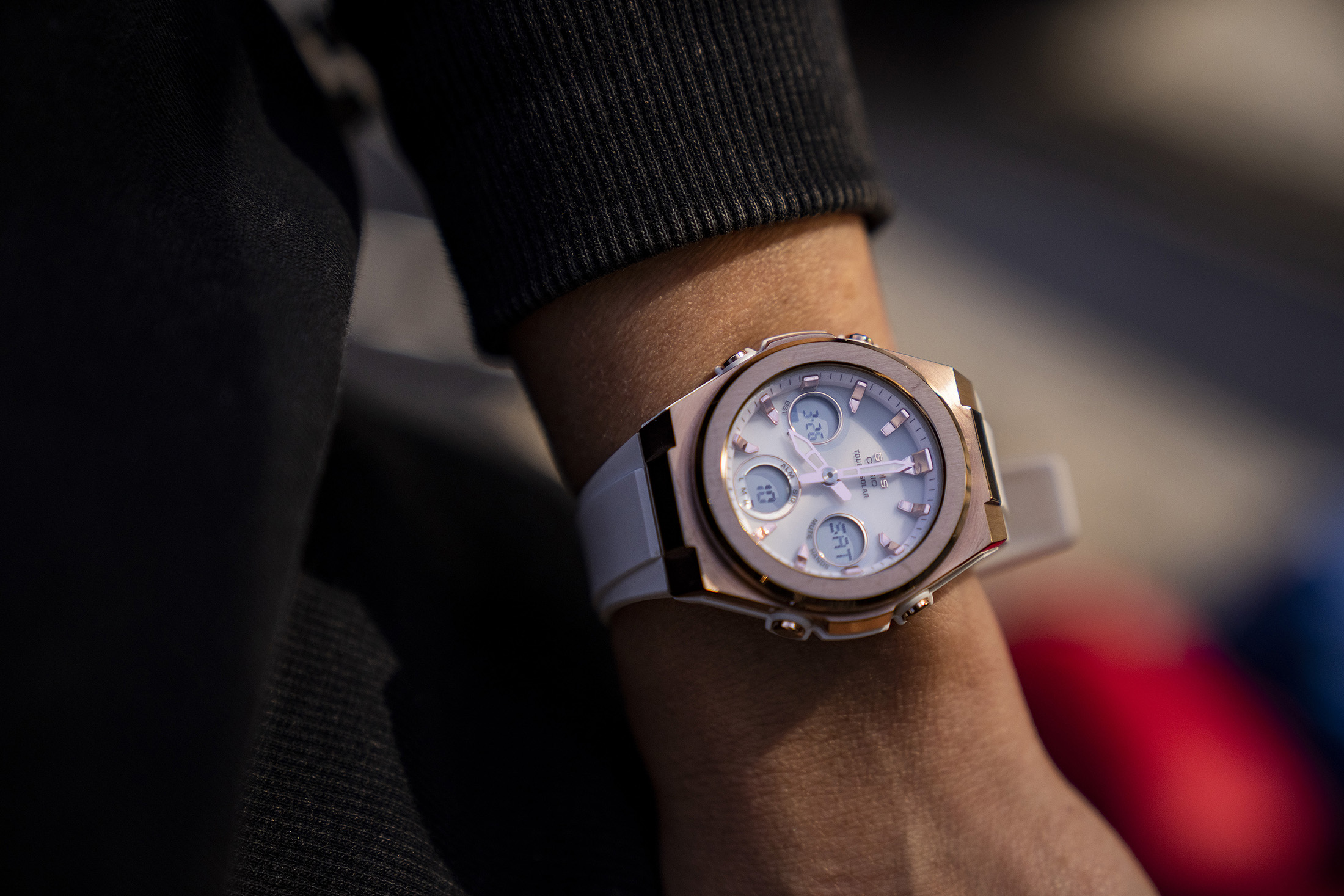 A woman wears a watch. 