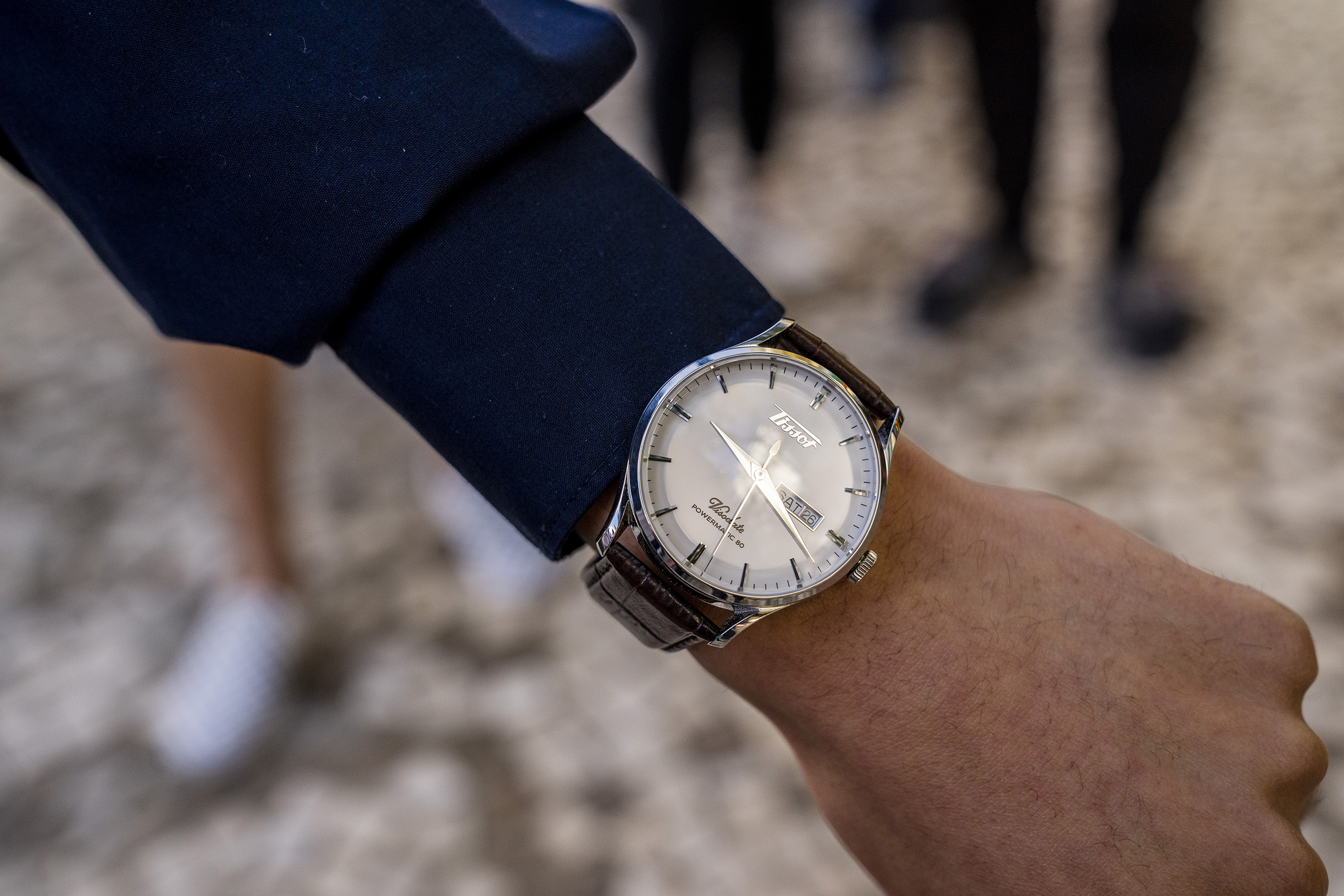 A man wears a watch. 