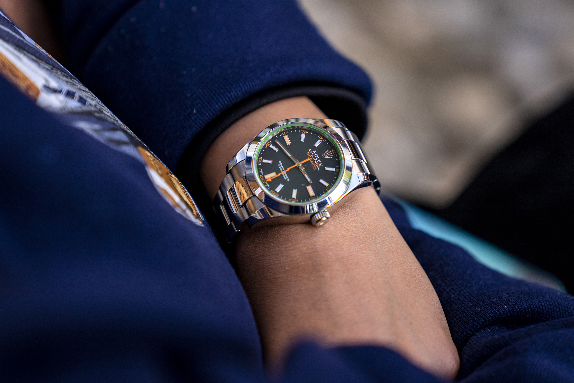 A woman wears a watch. 