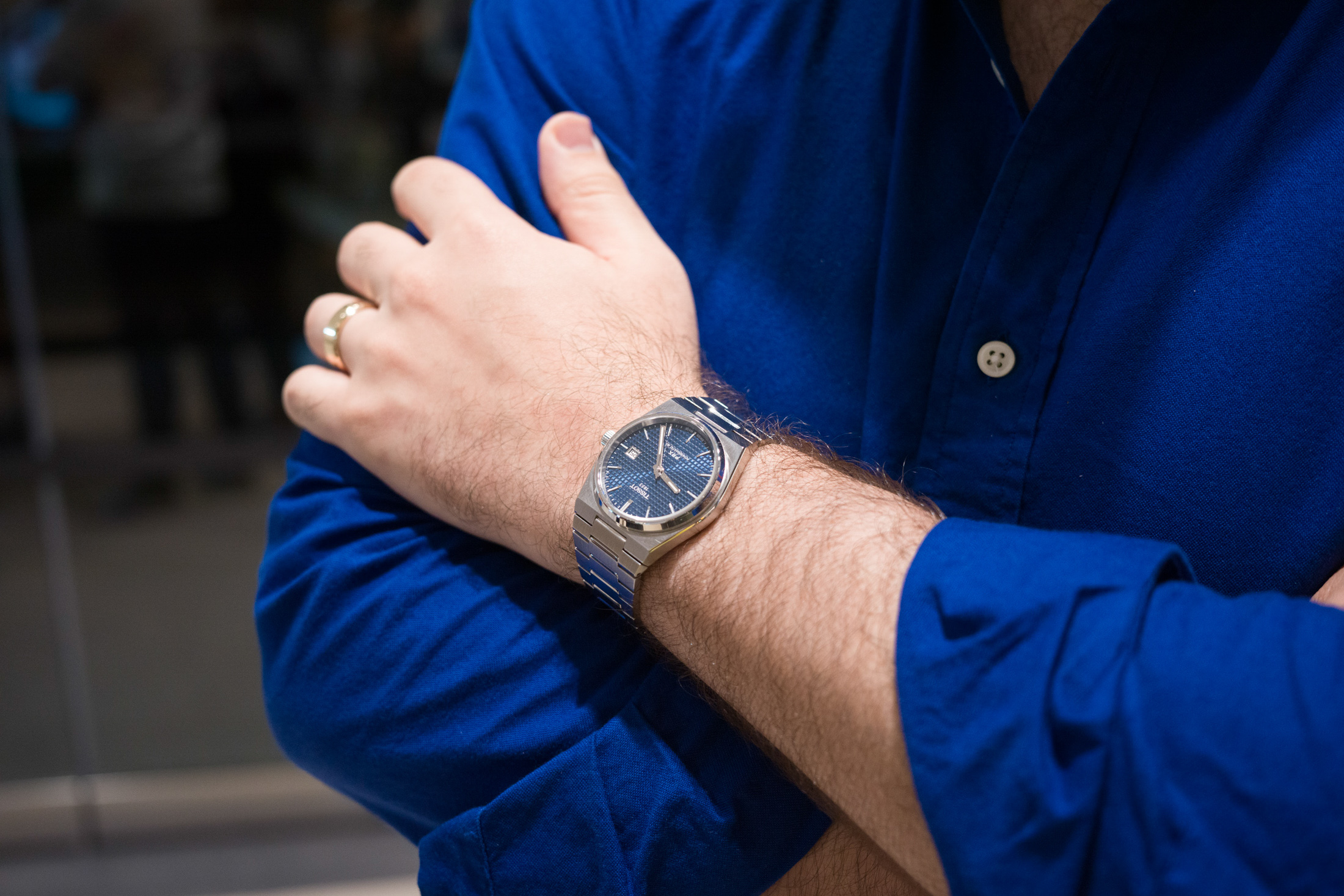 A man wears a watch. 