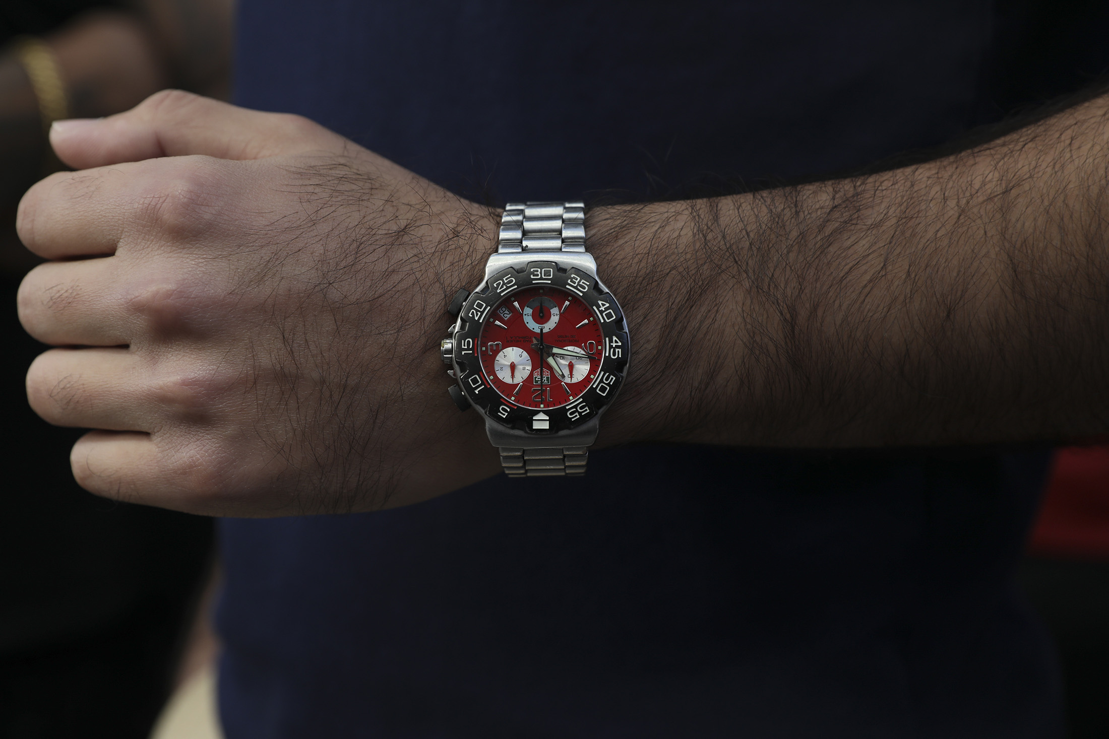 A man wears a watch. 