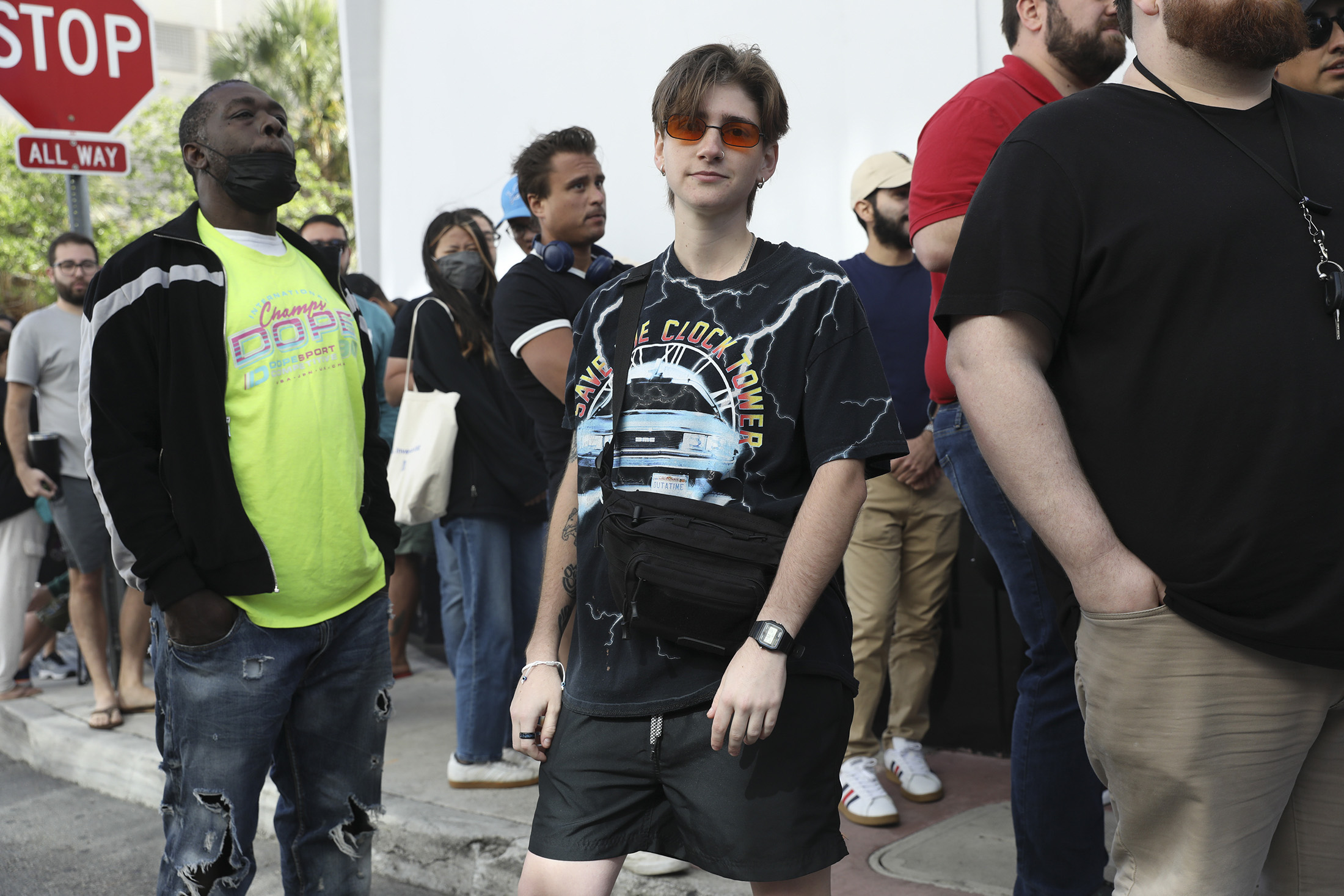 A man poses while wearing a watch.
