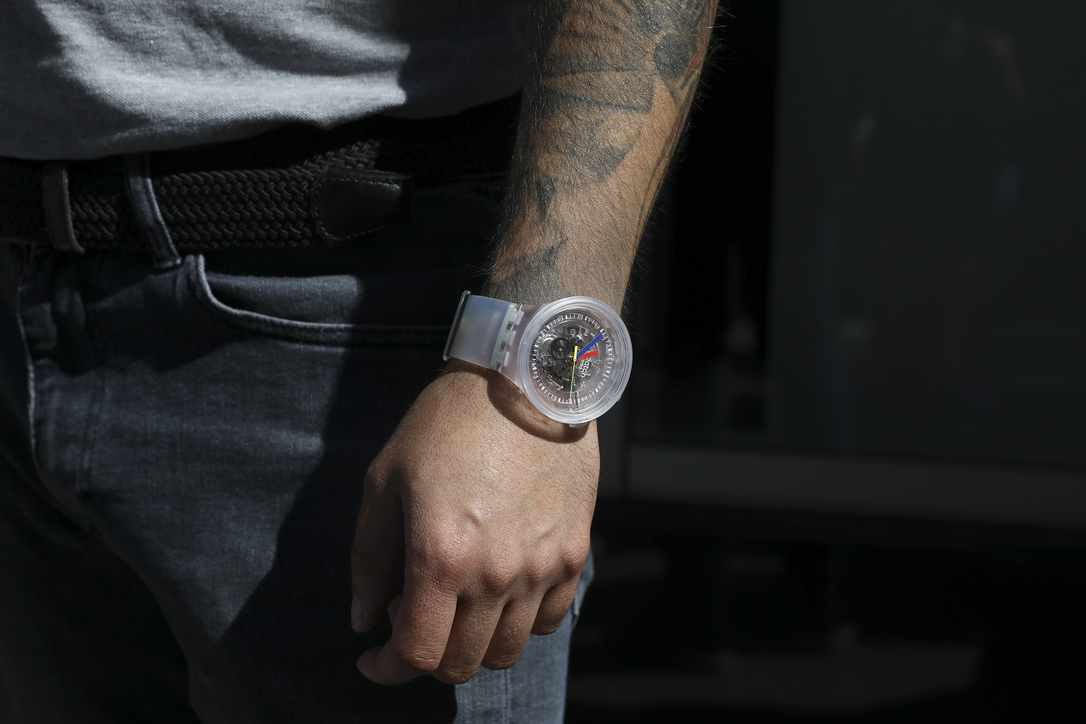 A man wears a watch. 