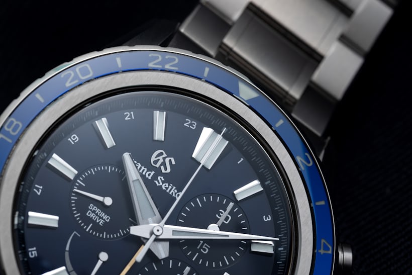 A close-up on the bezel of a Grand Seiko Spring Drive Chronograph GMT