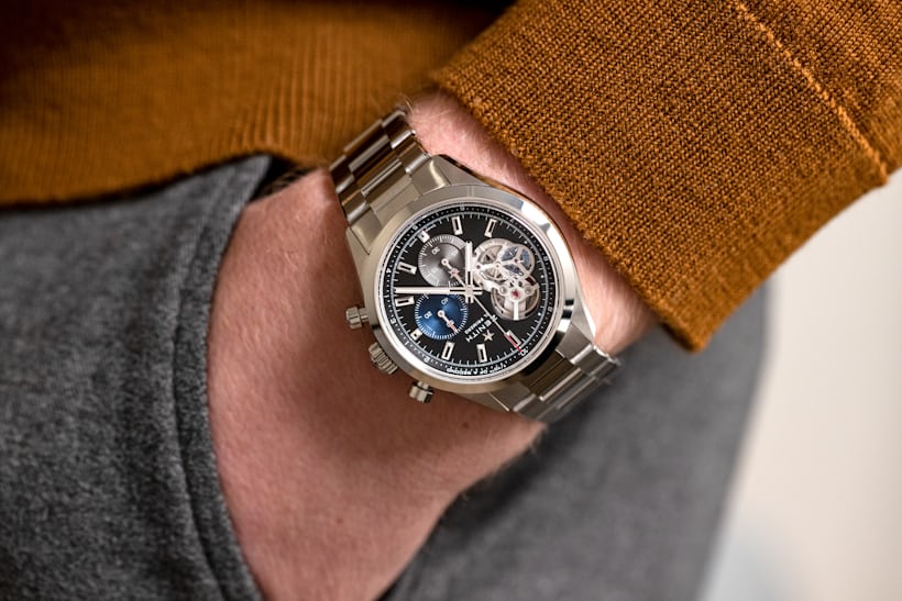 A man wears the new Zenith Chronomaster Open.