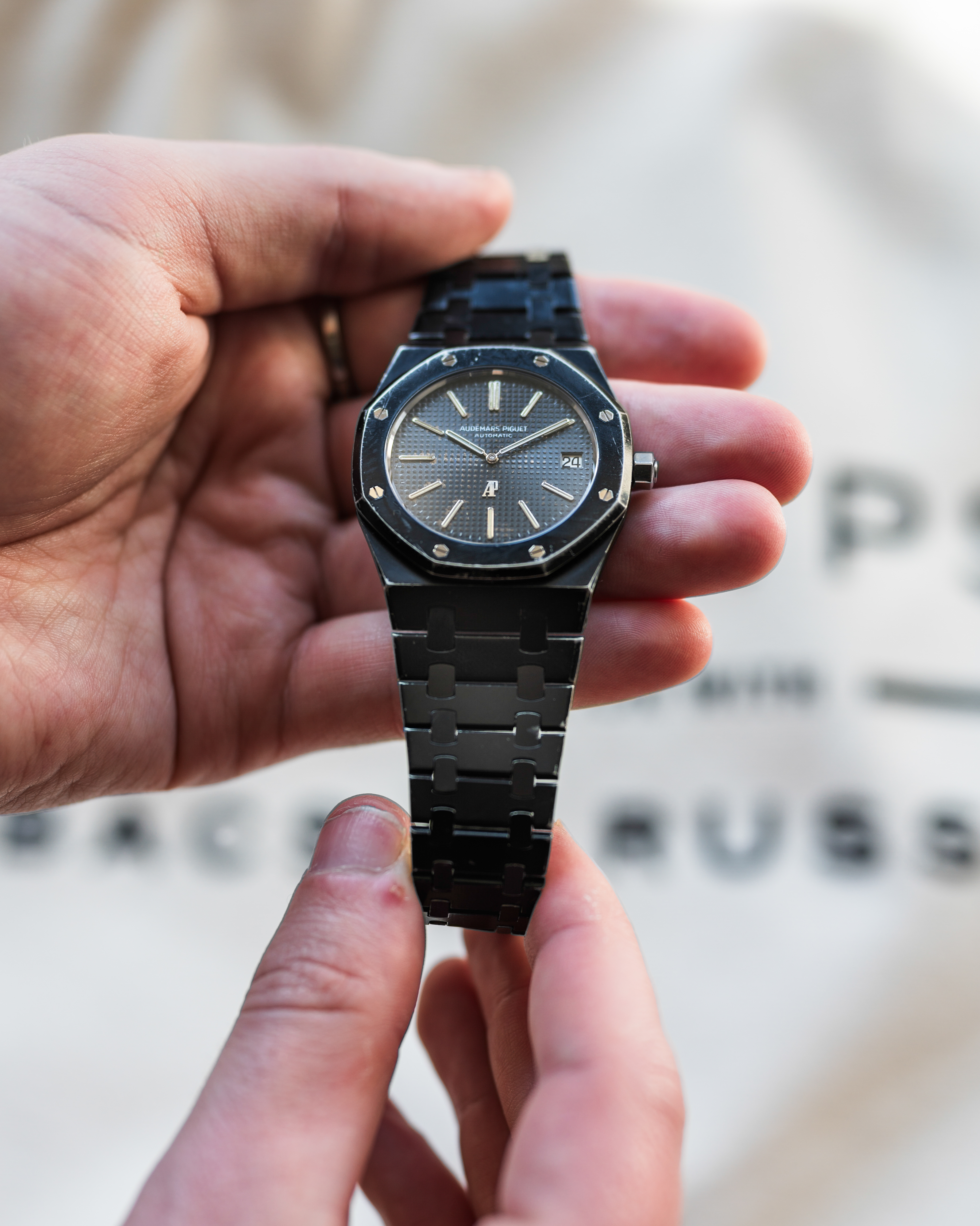 A vintage Audemars Piguet Royal Oak with a black PVD coating.