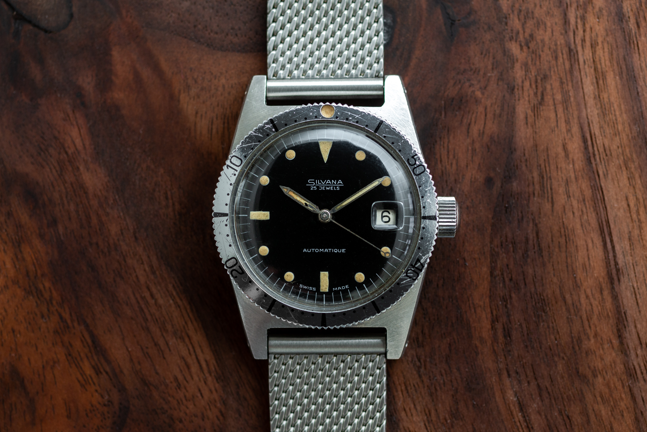 the skin diver on a piece of wood