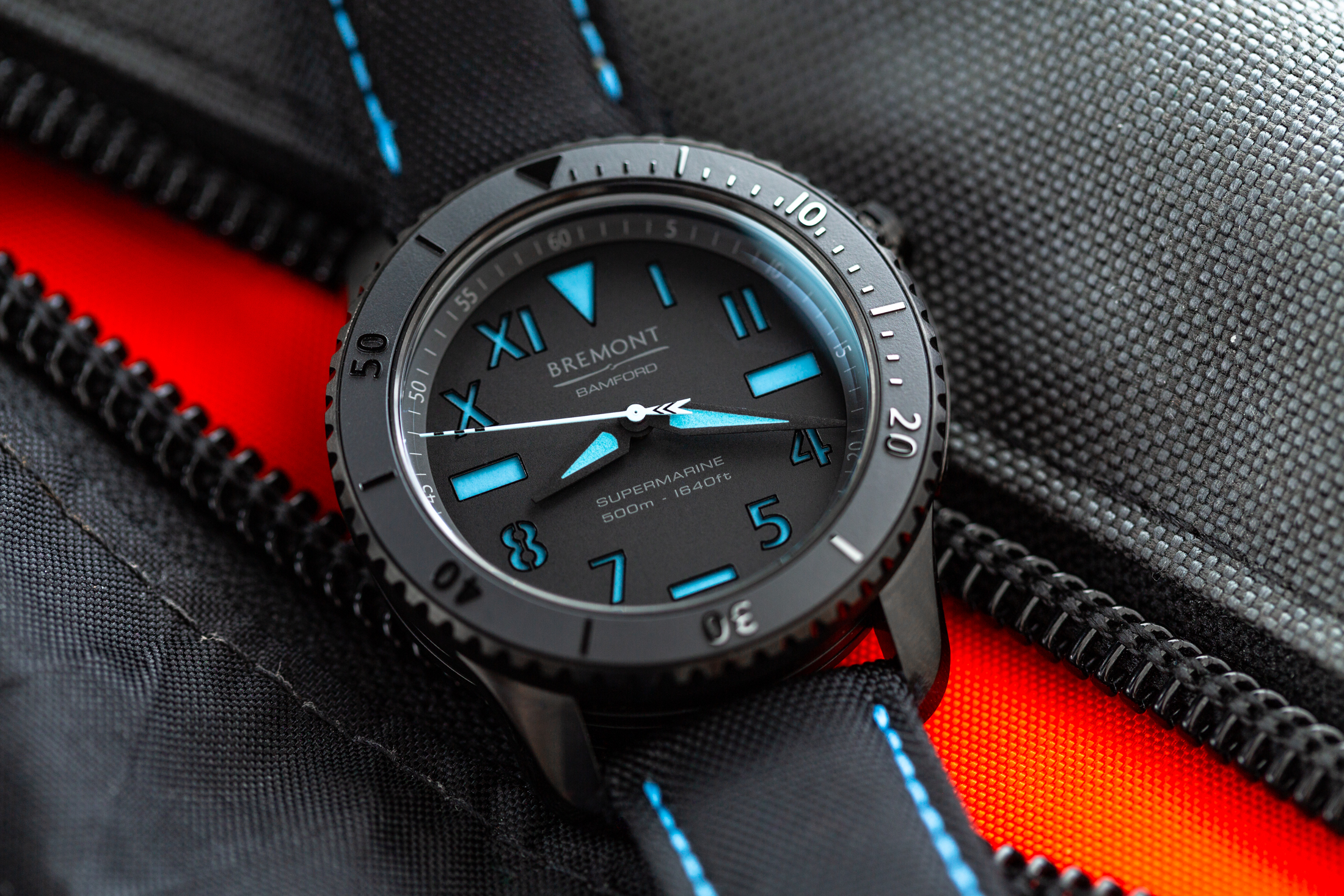 the bremont s500 bamford on a textured surface