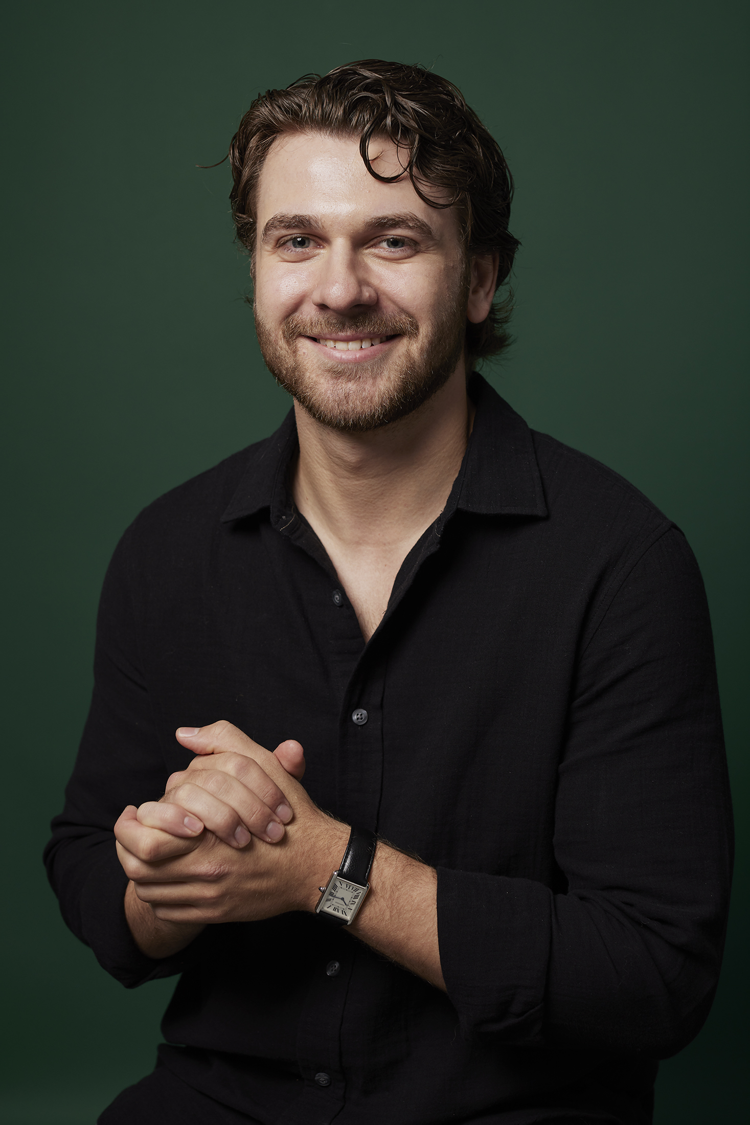 Portrait of Taylor wearing his Cartier Tank.