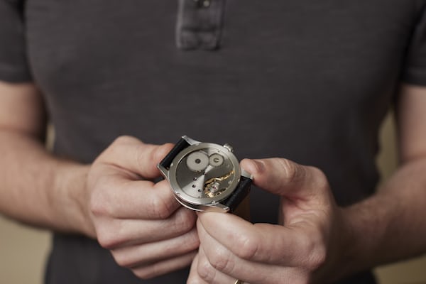 Caseback of Charles' watchmaking school watch.