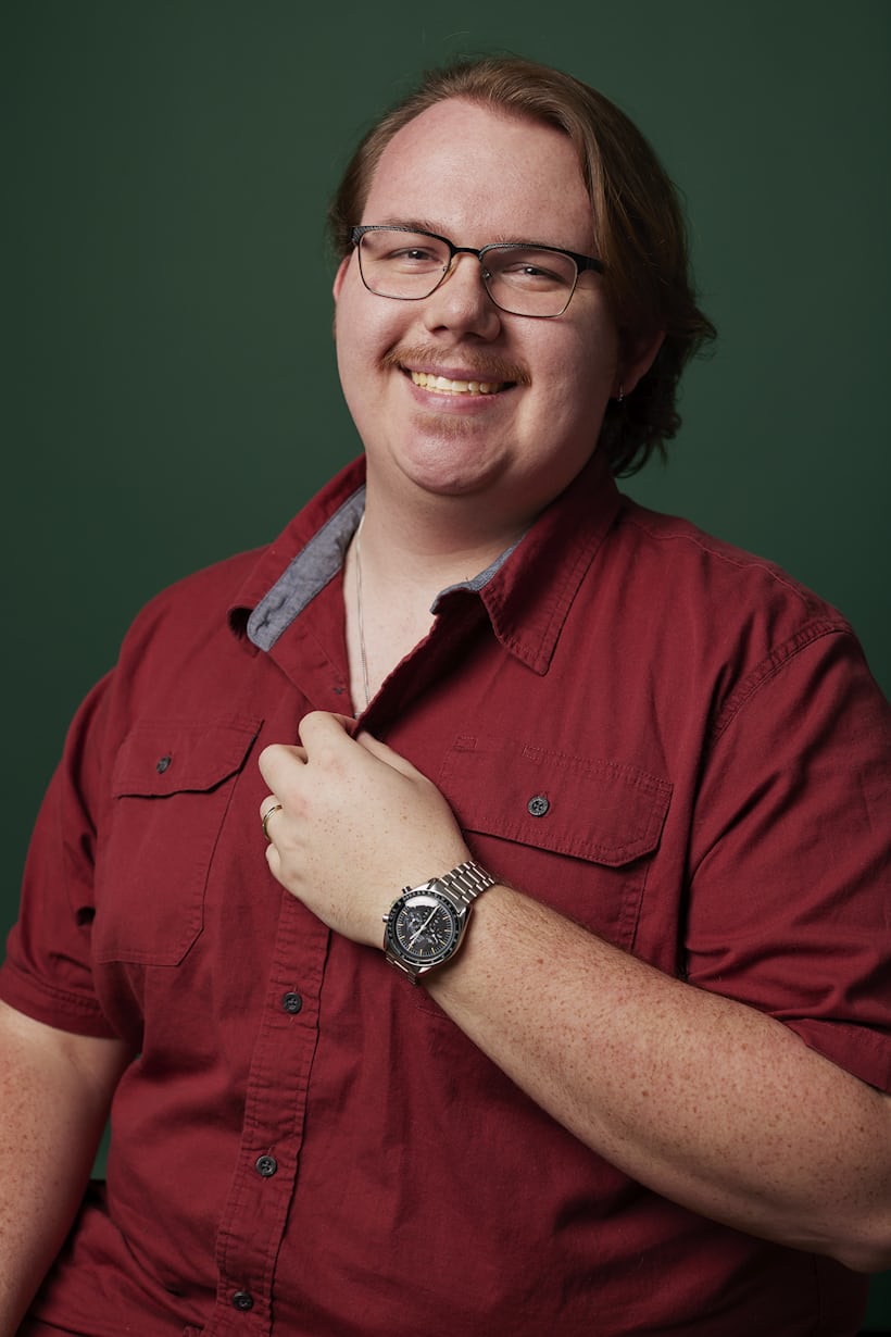 Portrait of Ryan and his Brietling watch.