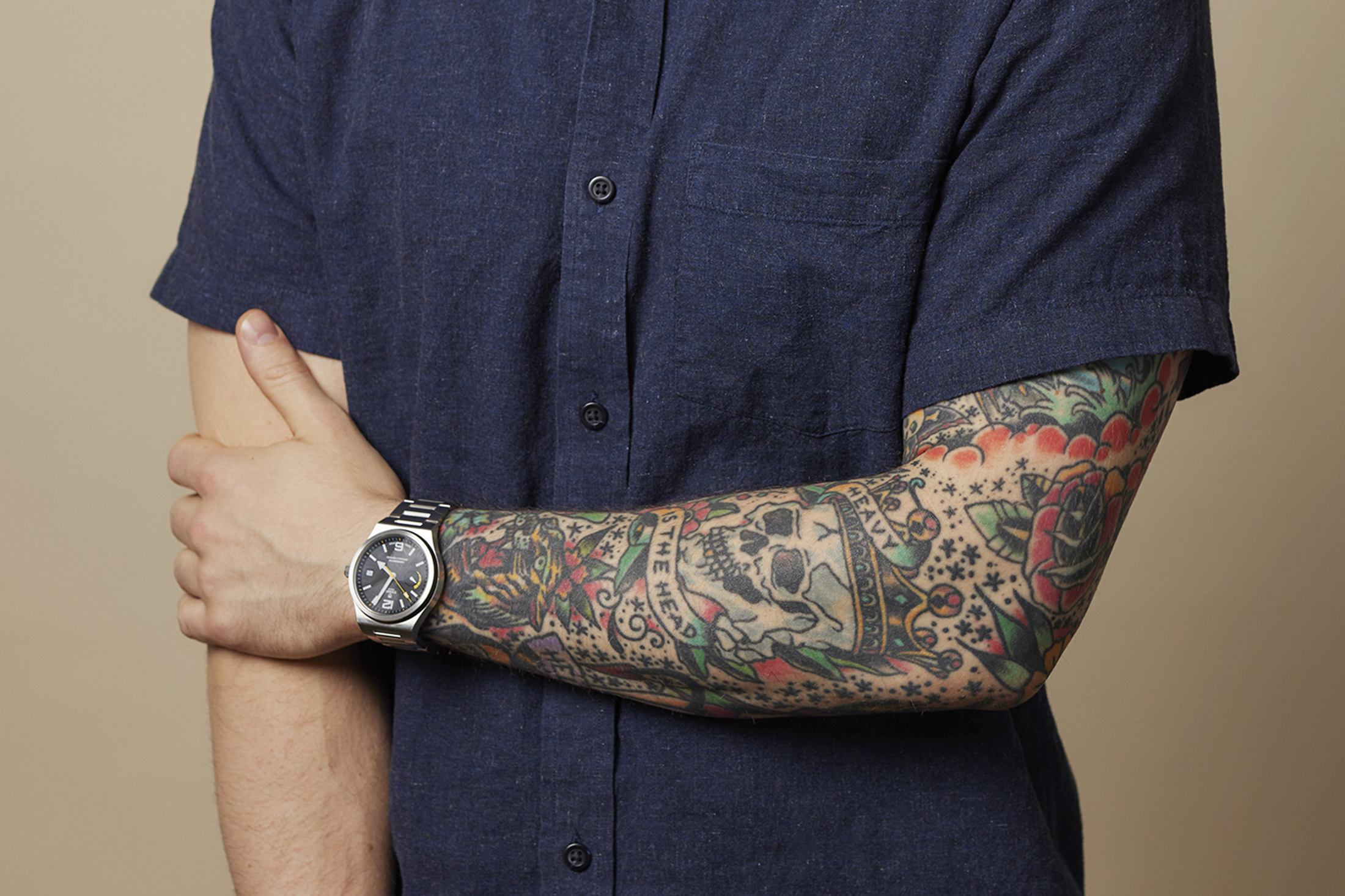 Tudor North Flag on wrist.