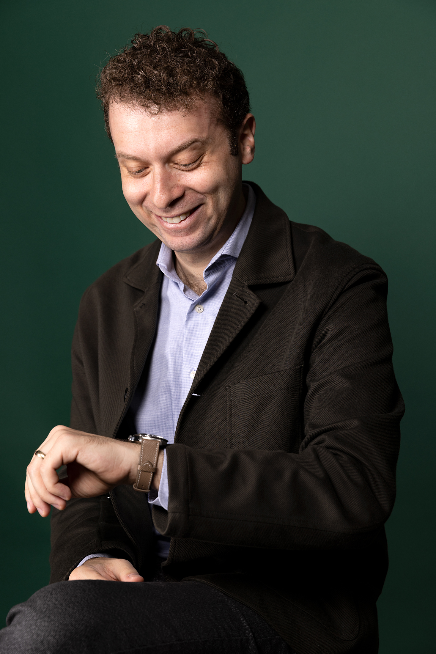 Danny Milton admiring his watch.