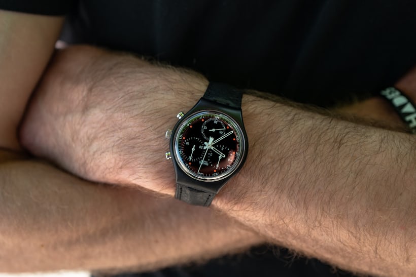 a black swatch chronograph. 