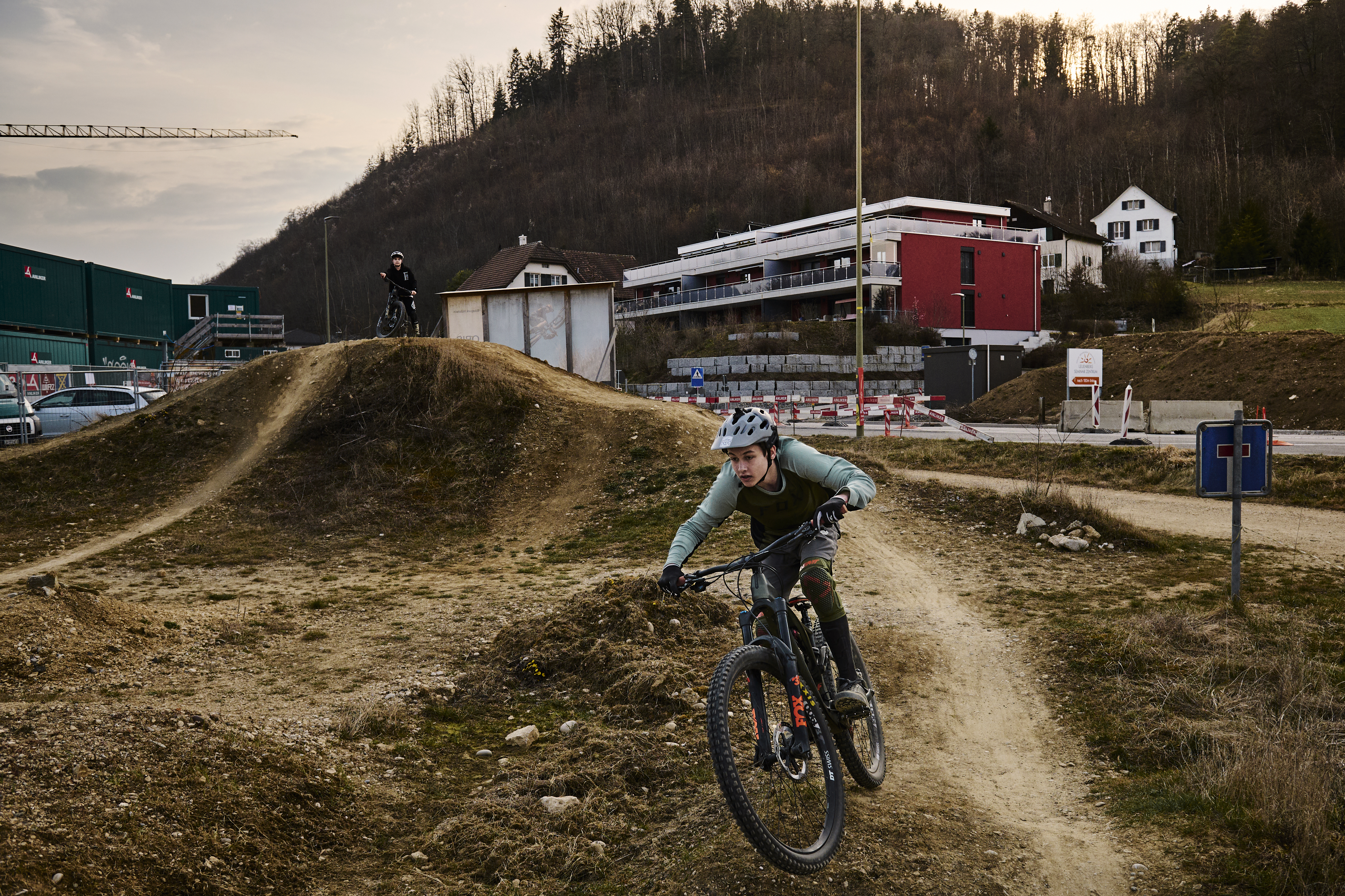 A child riding a bike in a bike park