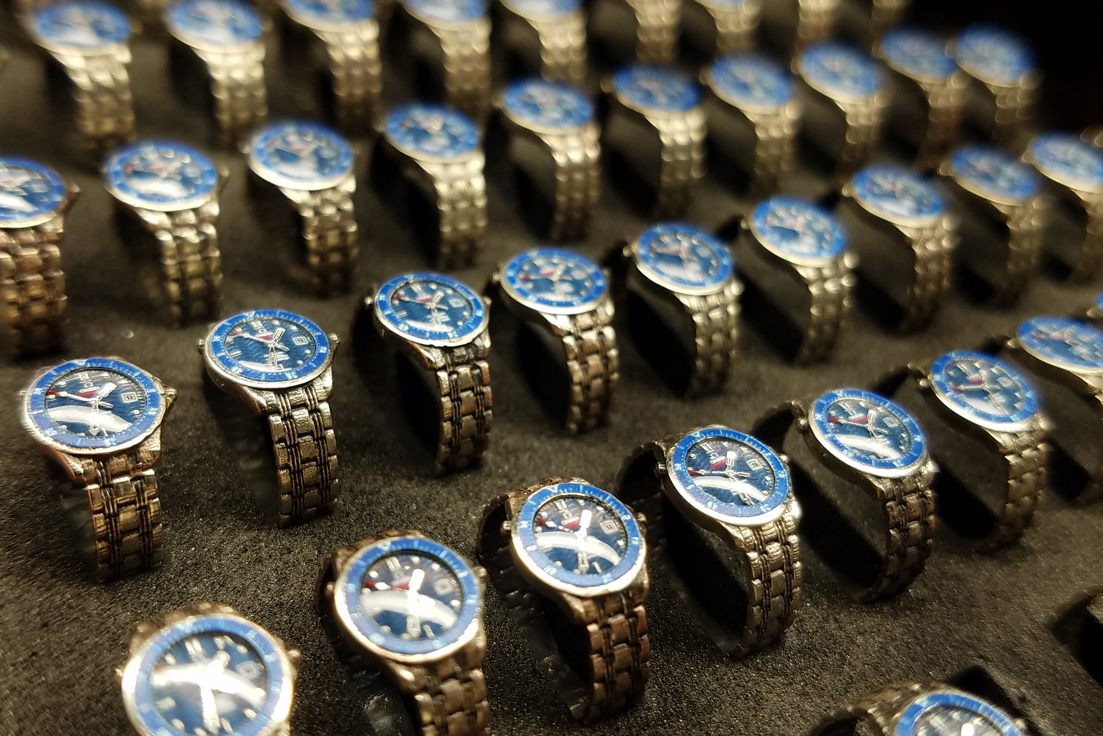 Tray of tiny Omega Seamasters