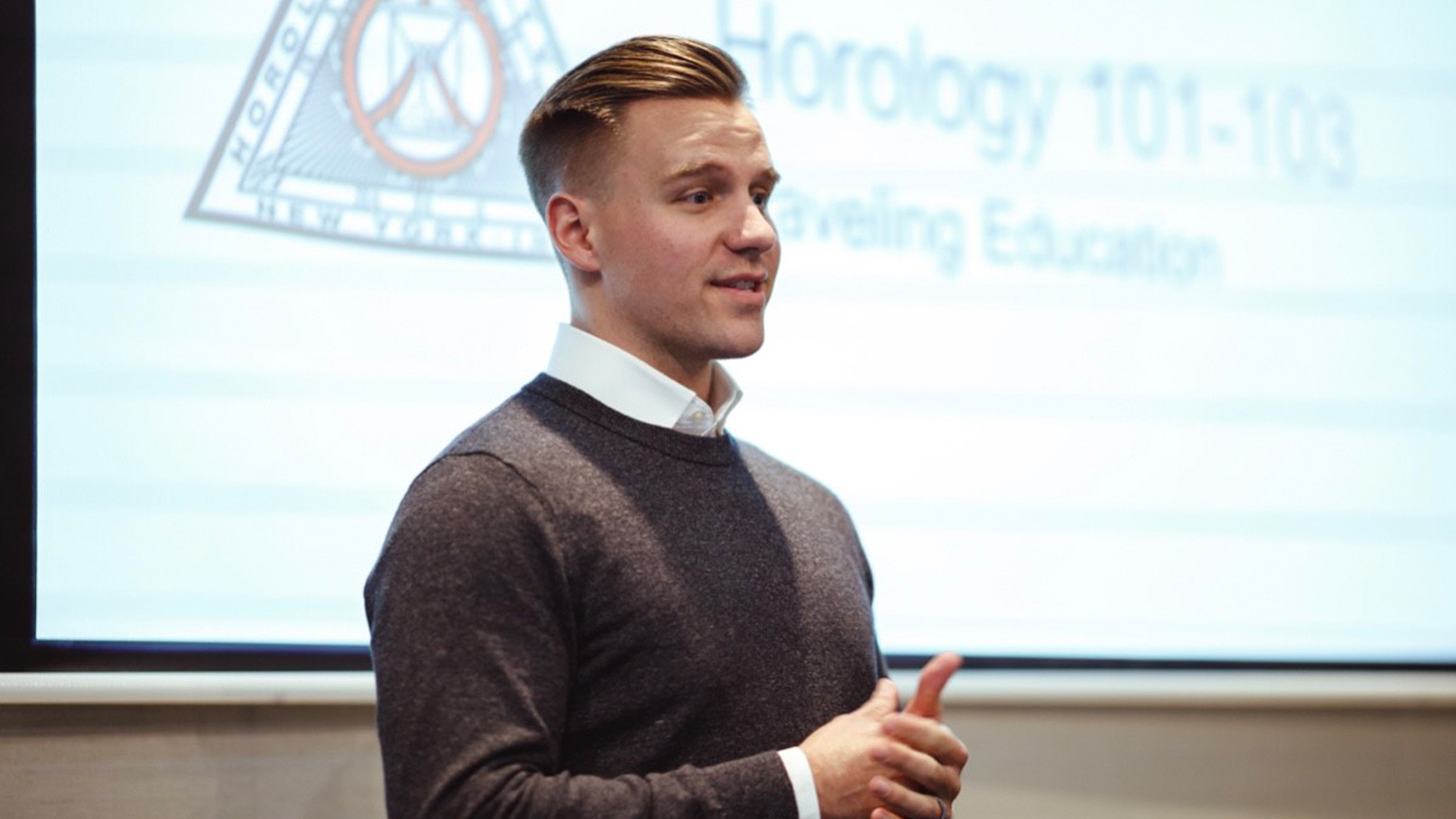 man talking to group