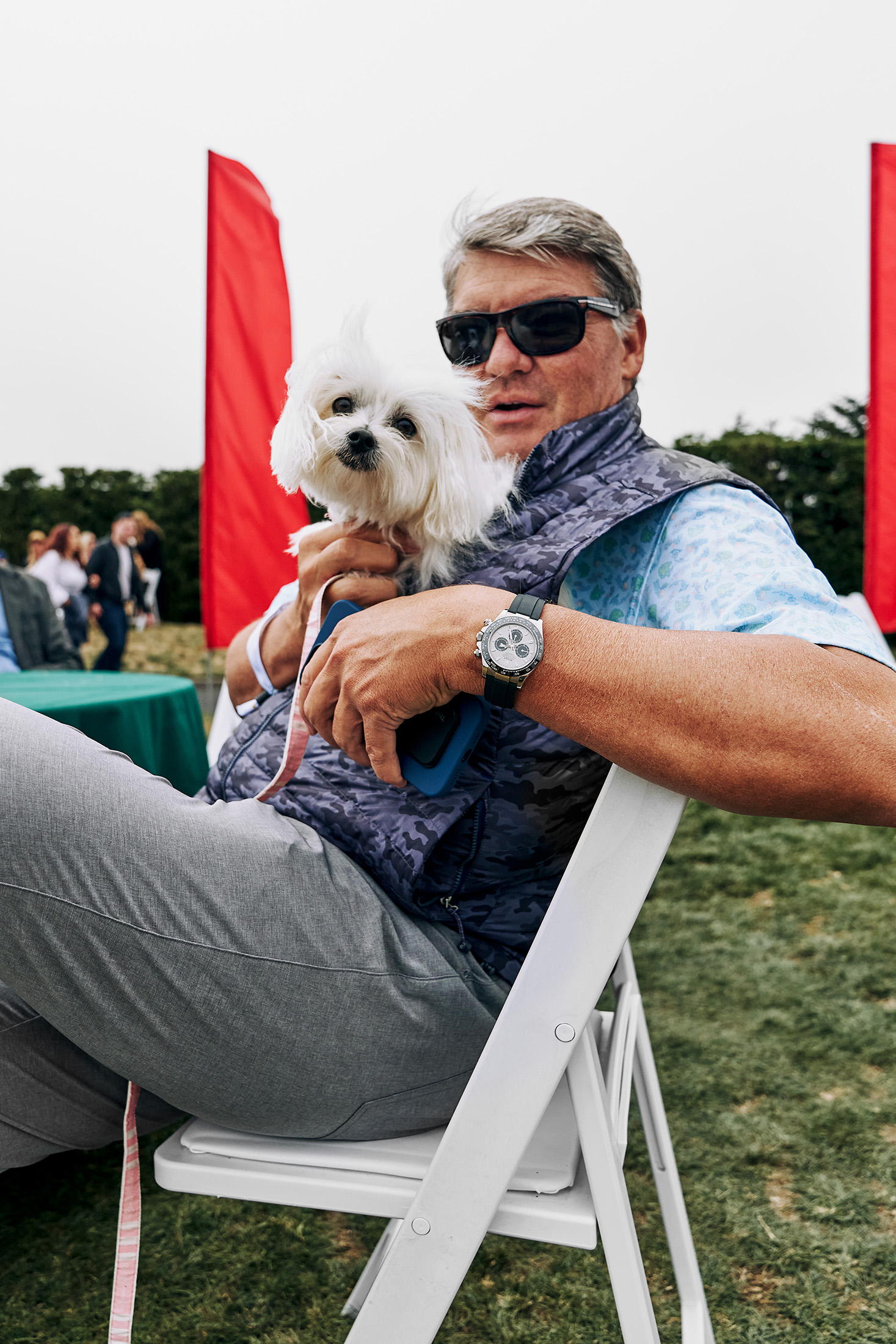 Man and dog posing for camera.