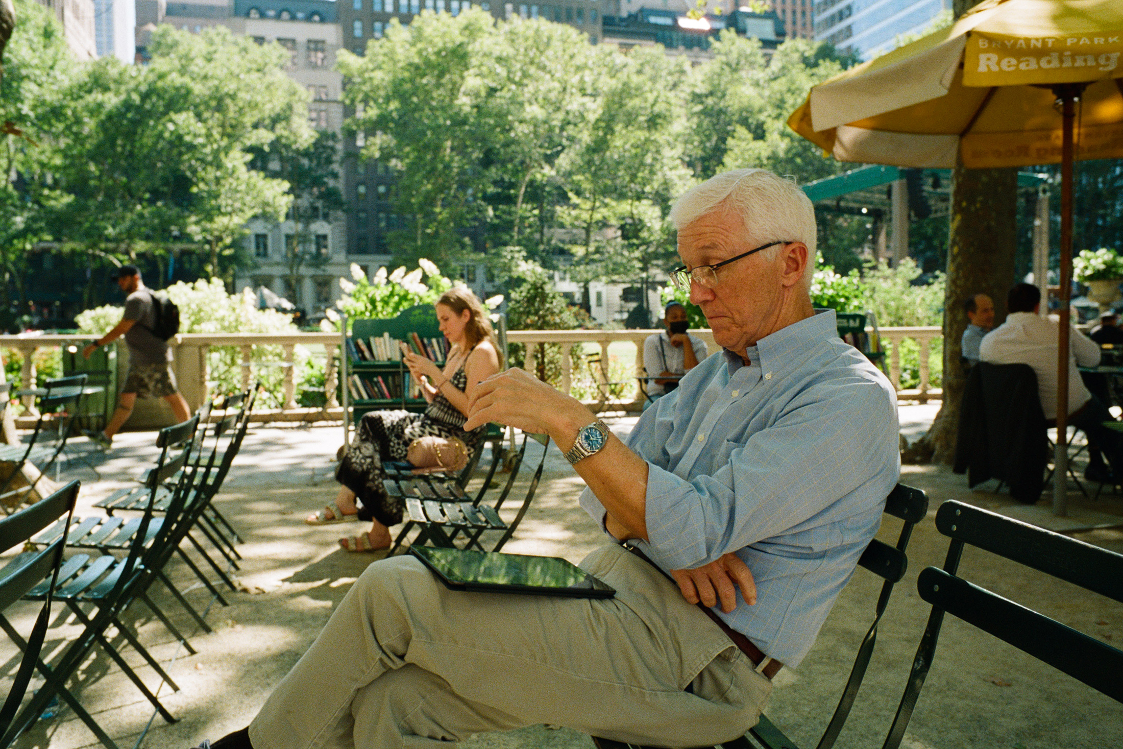 Man looking at an iPad.