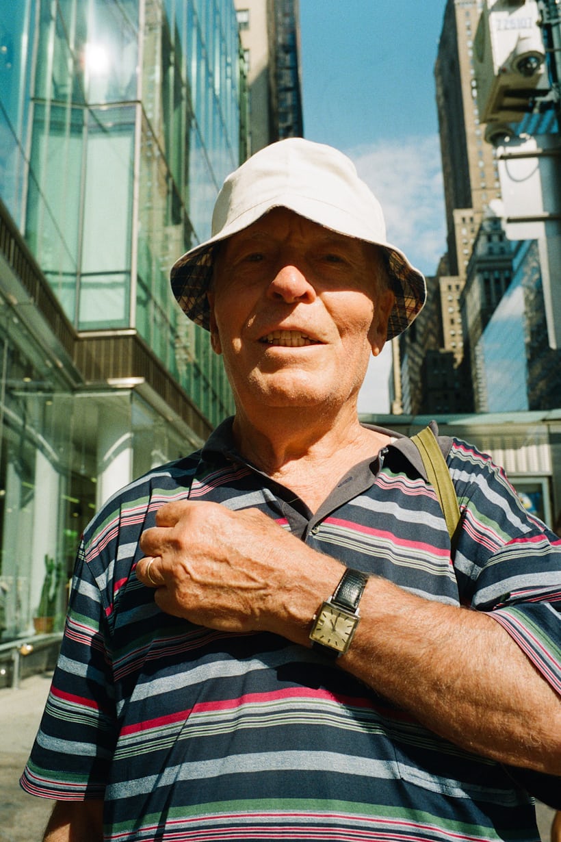 Man showing his watch to camera.