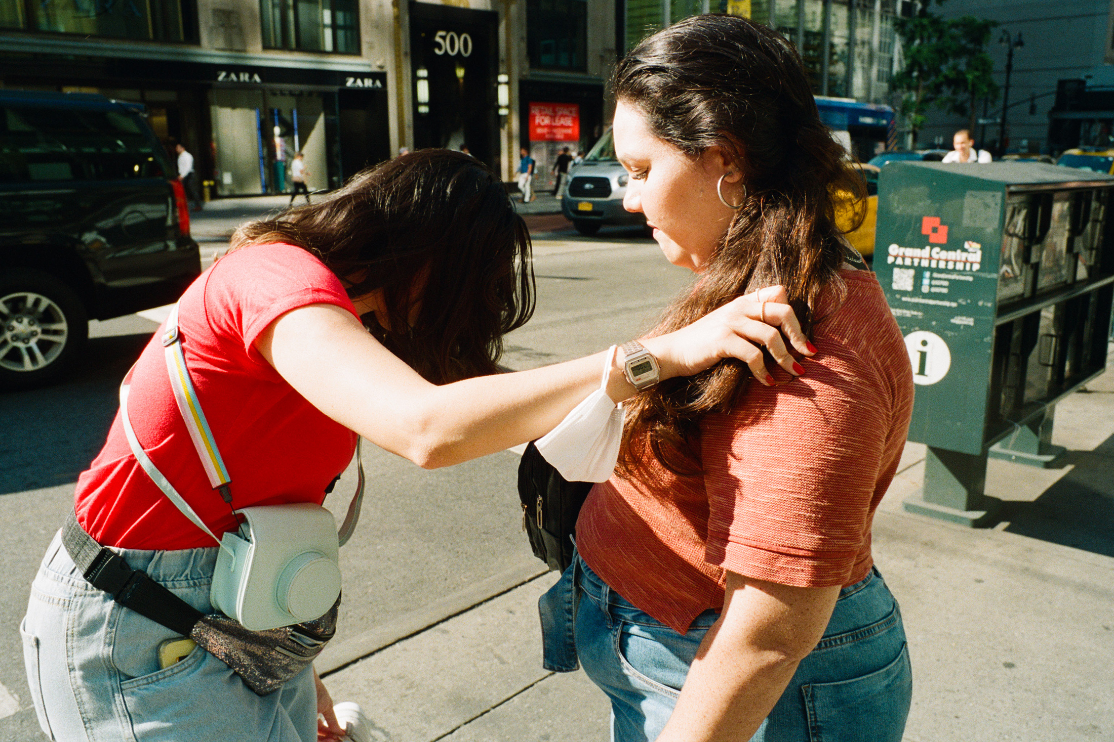 Woman fixing her shoe.
