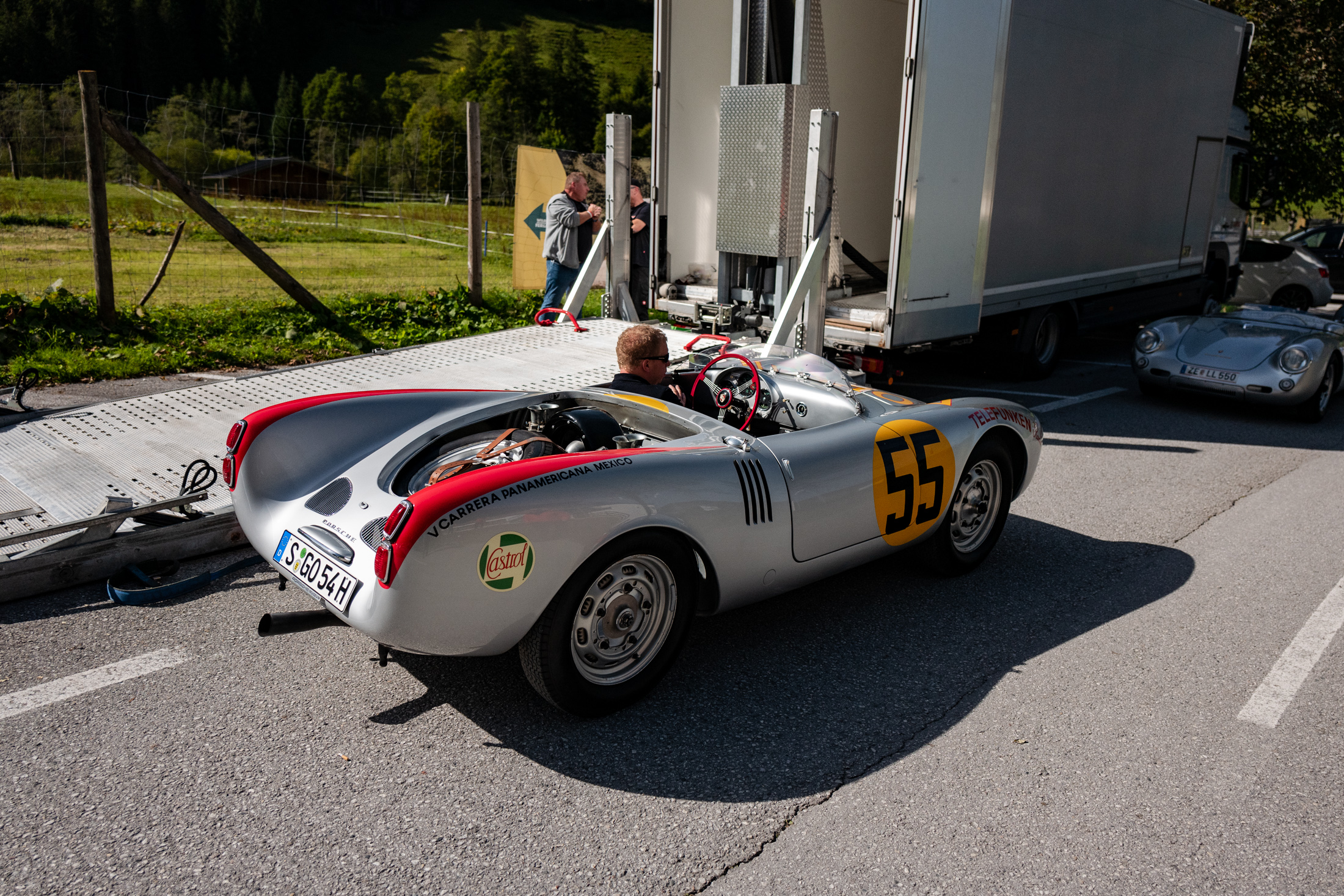 porsche 550s on a road. 