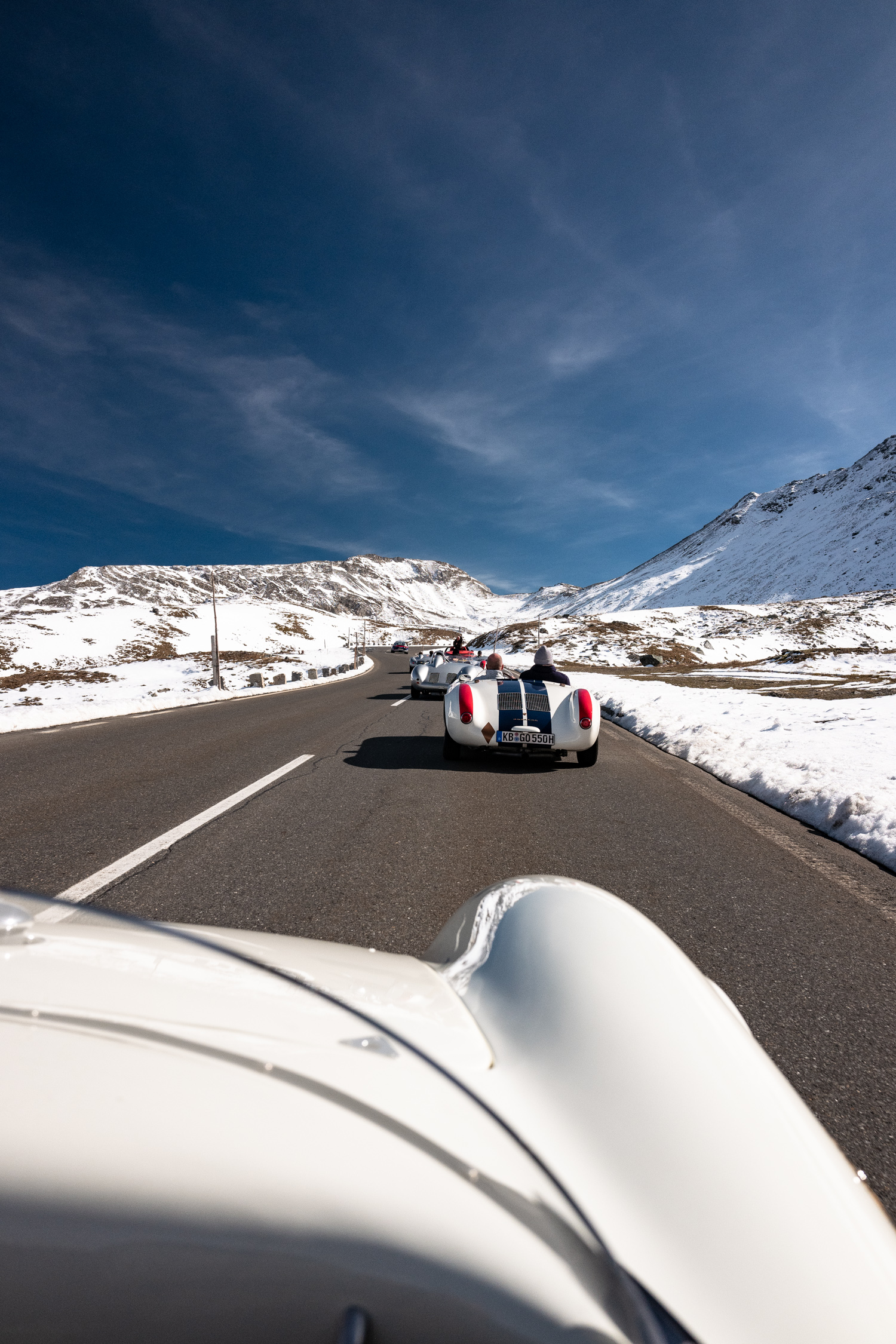 porsche 550s on a road. 