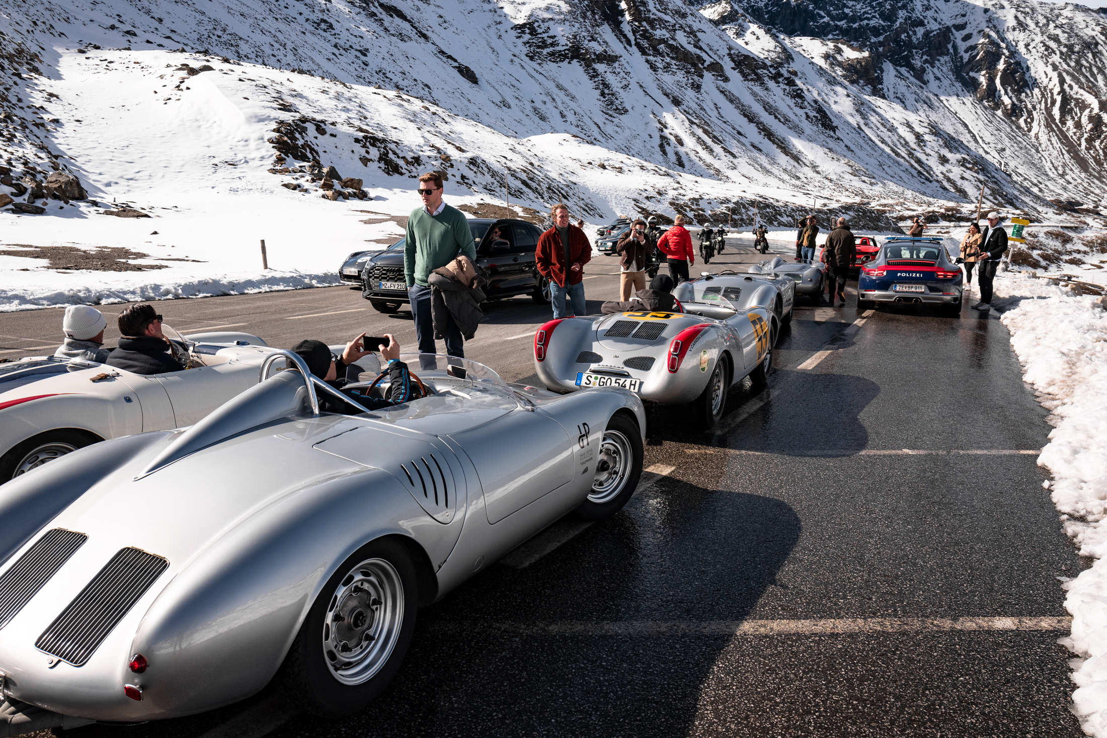 porsche 550s on a road. 
