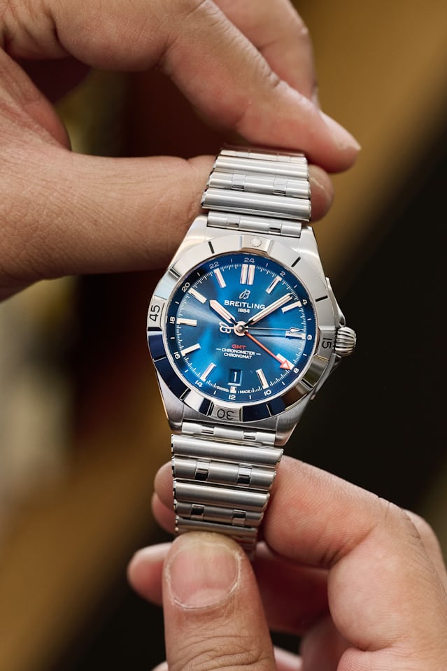 The blue dial Breitling Chronomat Automatic GMT.