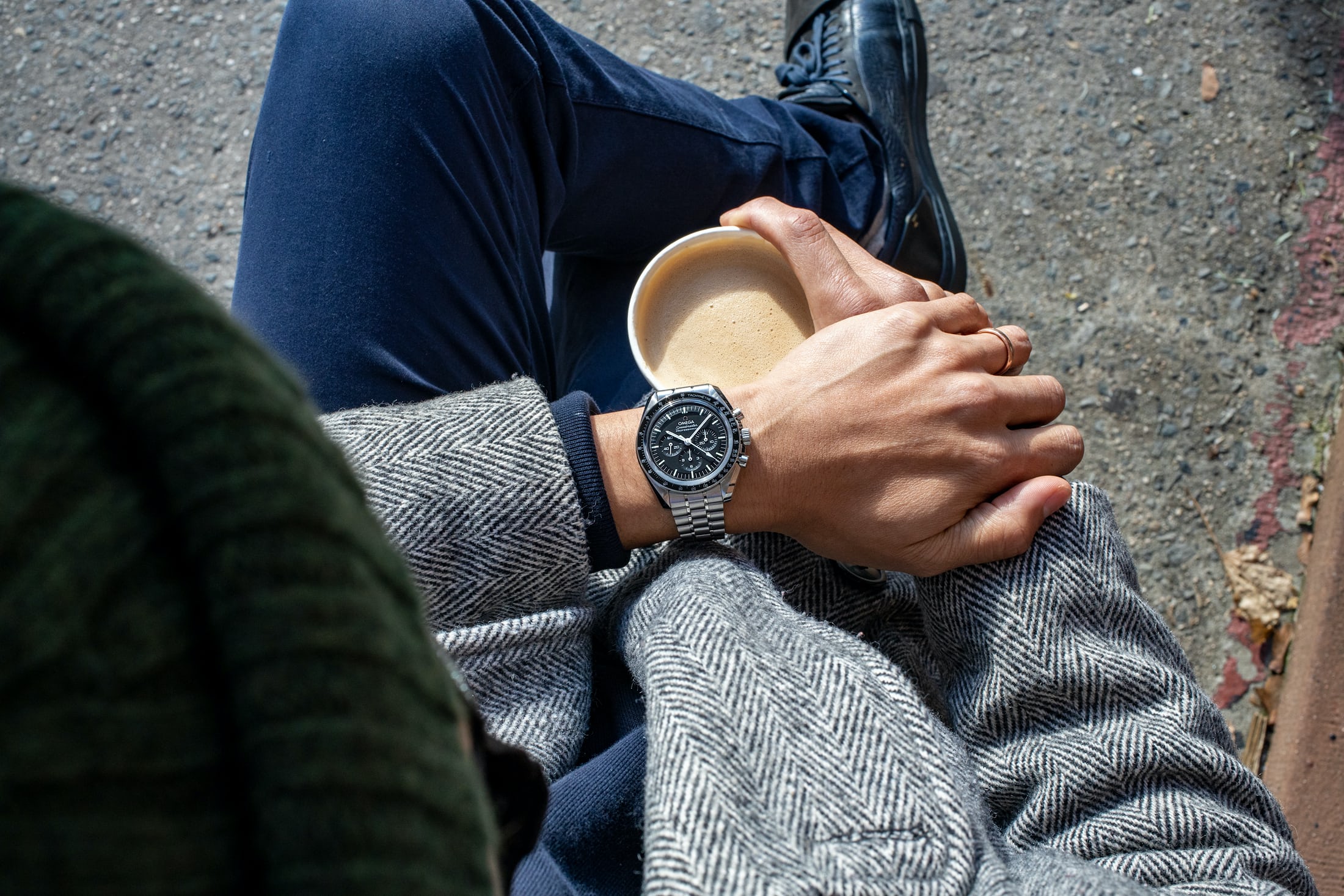 Omega speedmaster on wrist. 