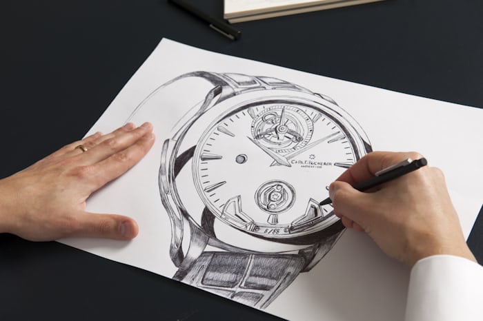 A designer sketching a watch at Carl F. Bucherer 