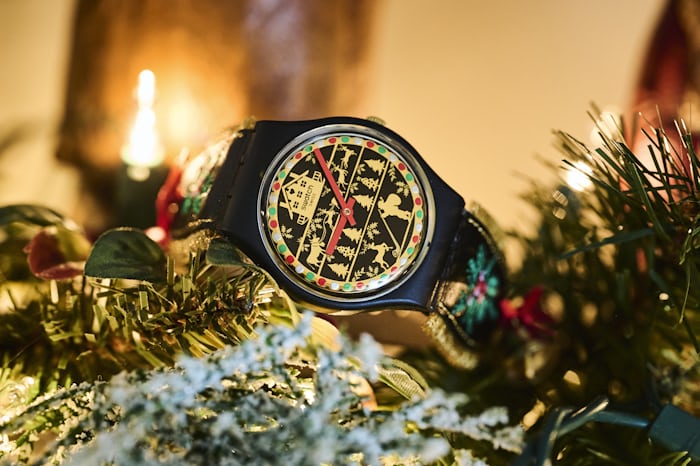 The Swatch Golden Merry Christmas sweater watch.