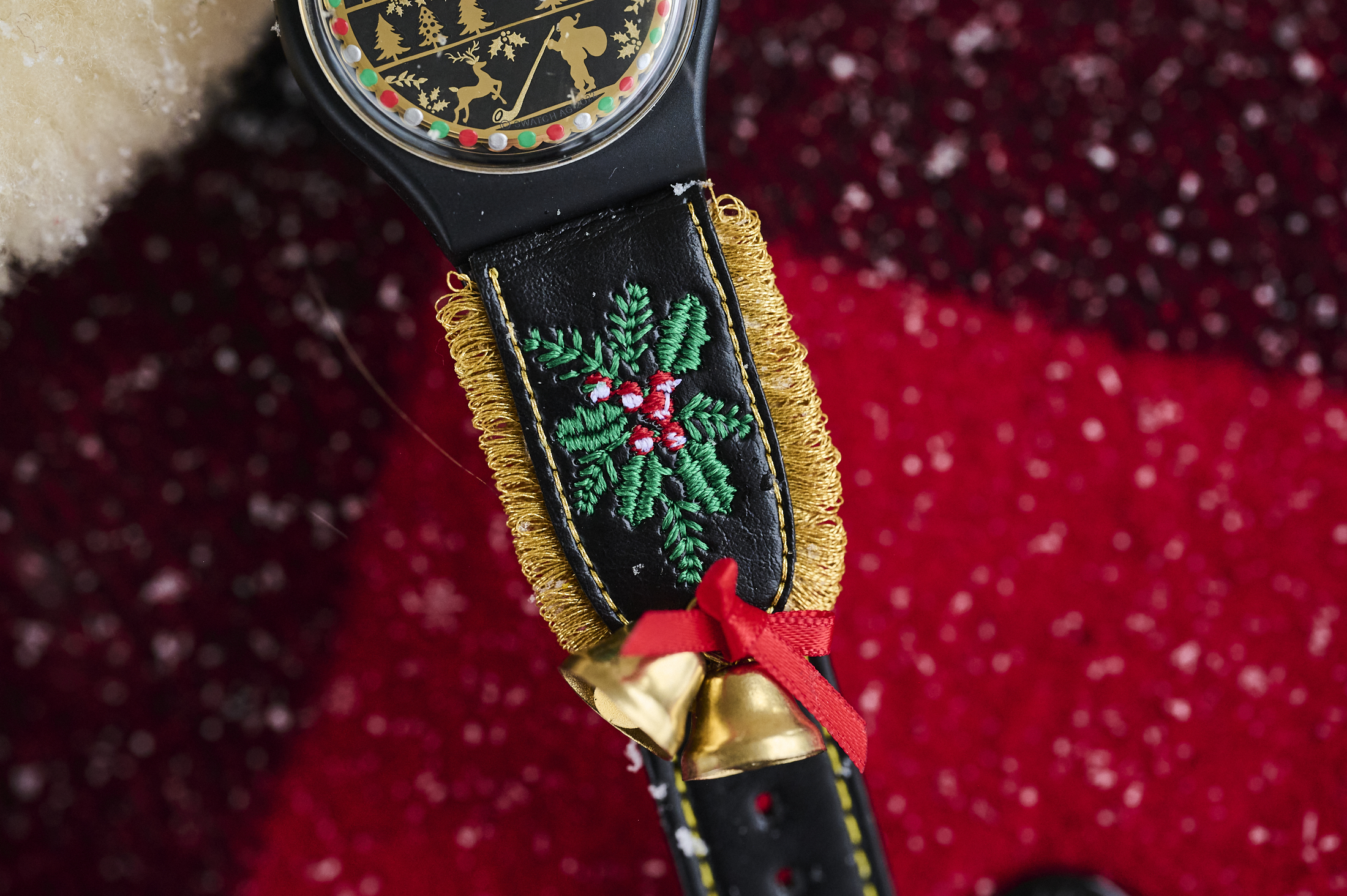 The Swatch Golden Merry Christmas sweater watch bells