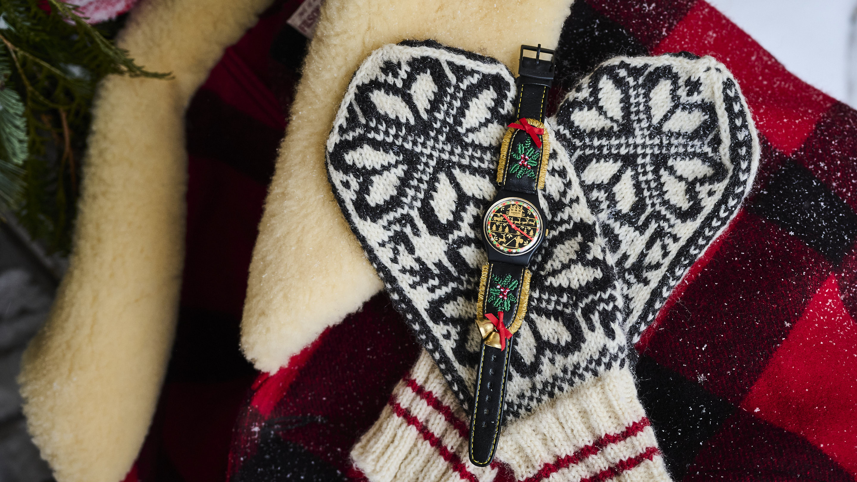 The Swatch Golden Merry Christmas sweater watch on selbu mittens