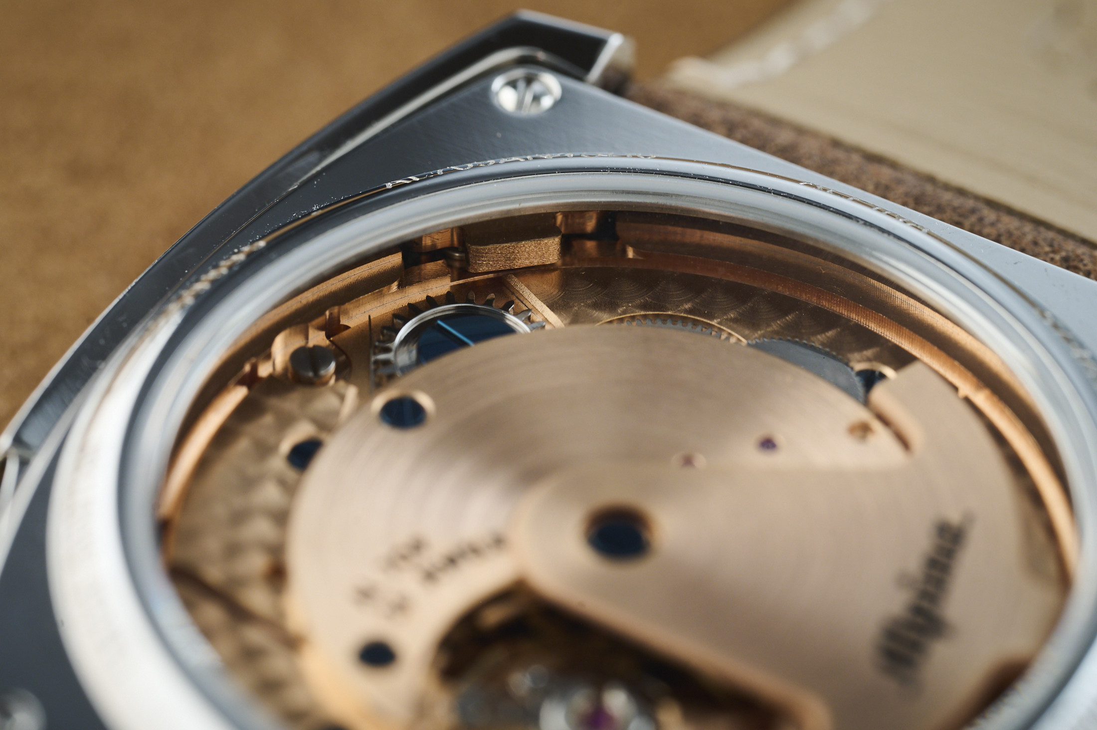 The lip that the weight bumps against in the movement.